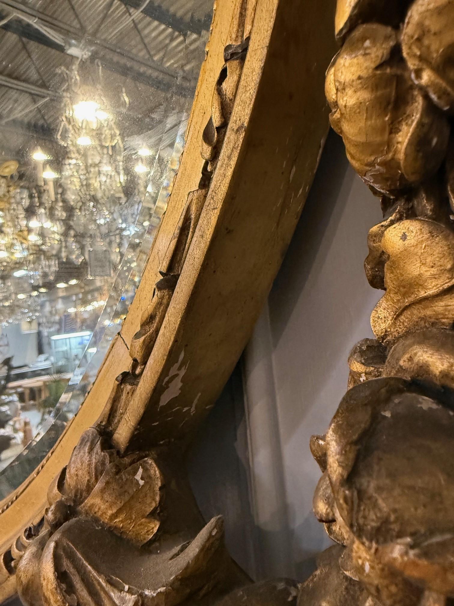 Miroir ovale français Louis XVI du XIXe siècle en bois doré en vente 13
