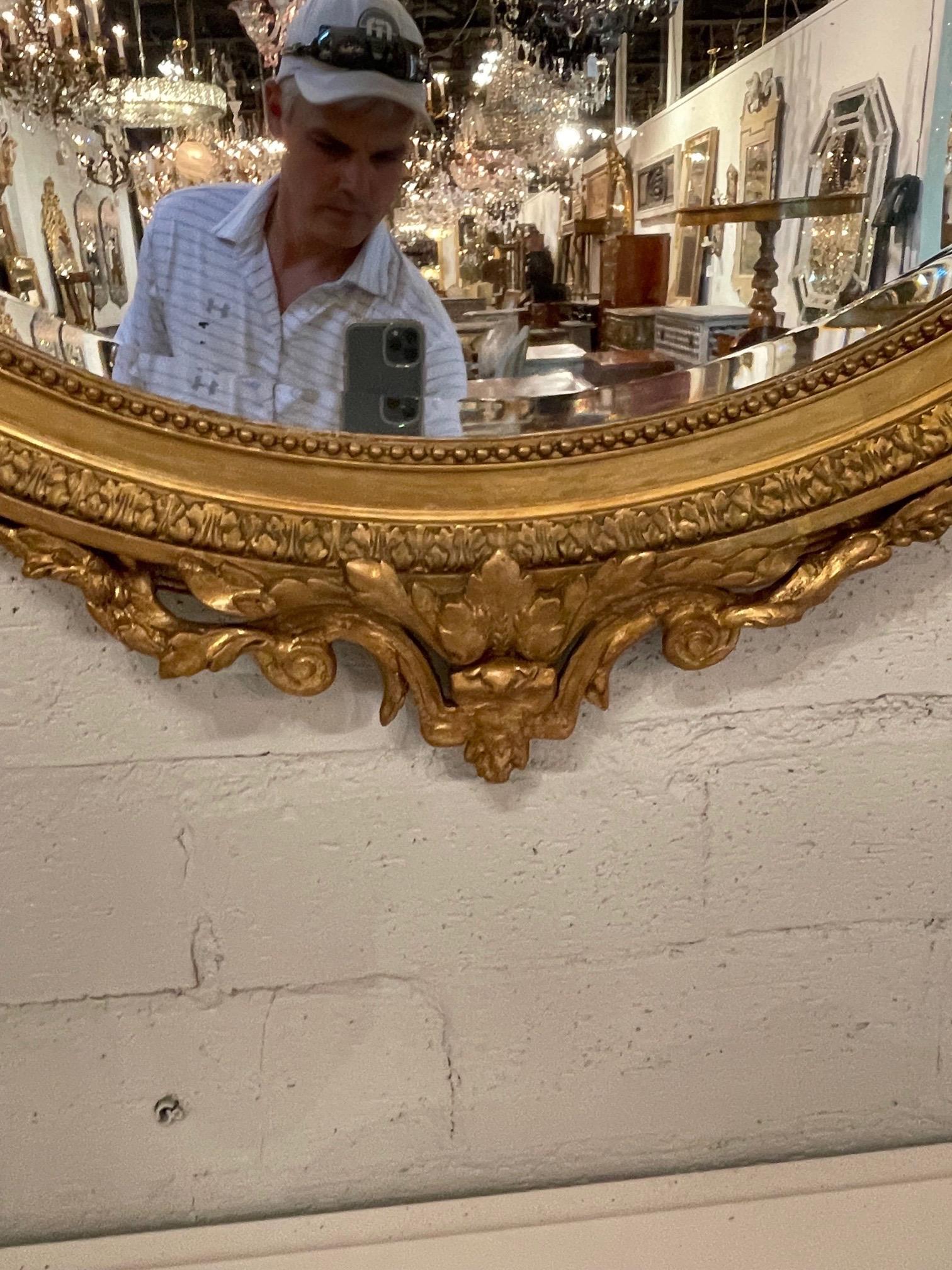 Miroir ovale français Louis XVI du XIXe siècle en bois doré en vente 1