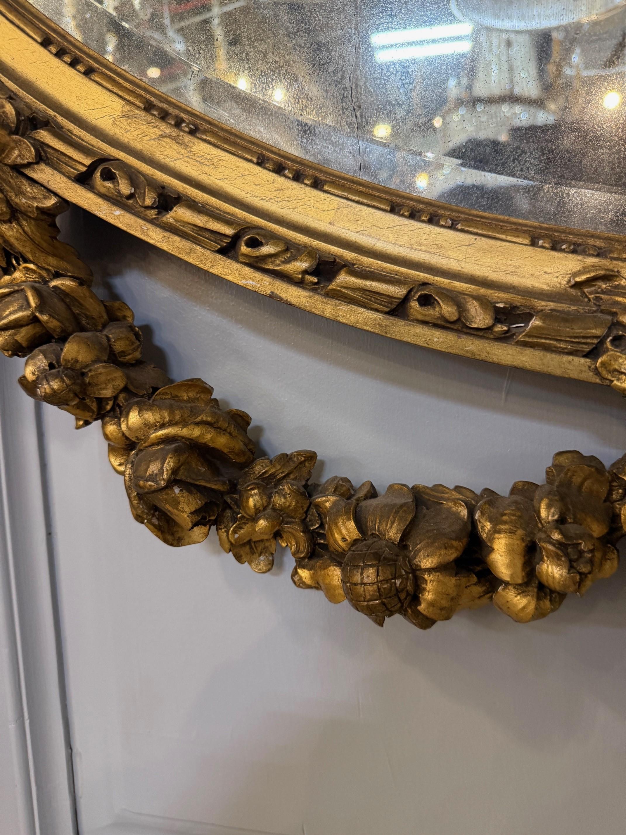 Miroir ovale français Louis XVI du XIXe siècle en bois doré en vente 2