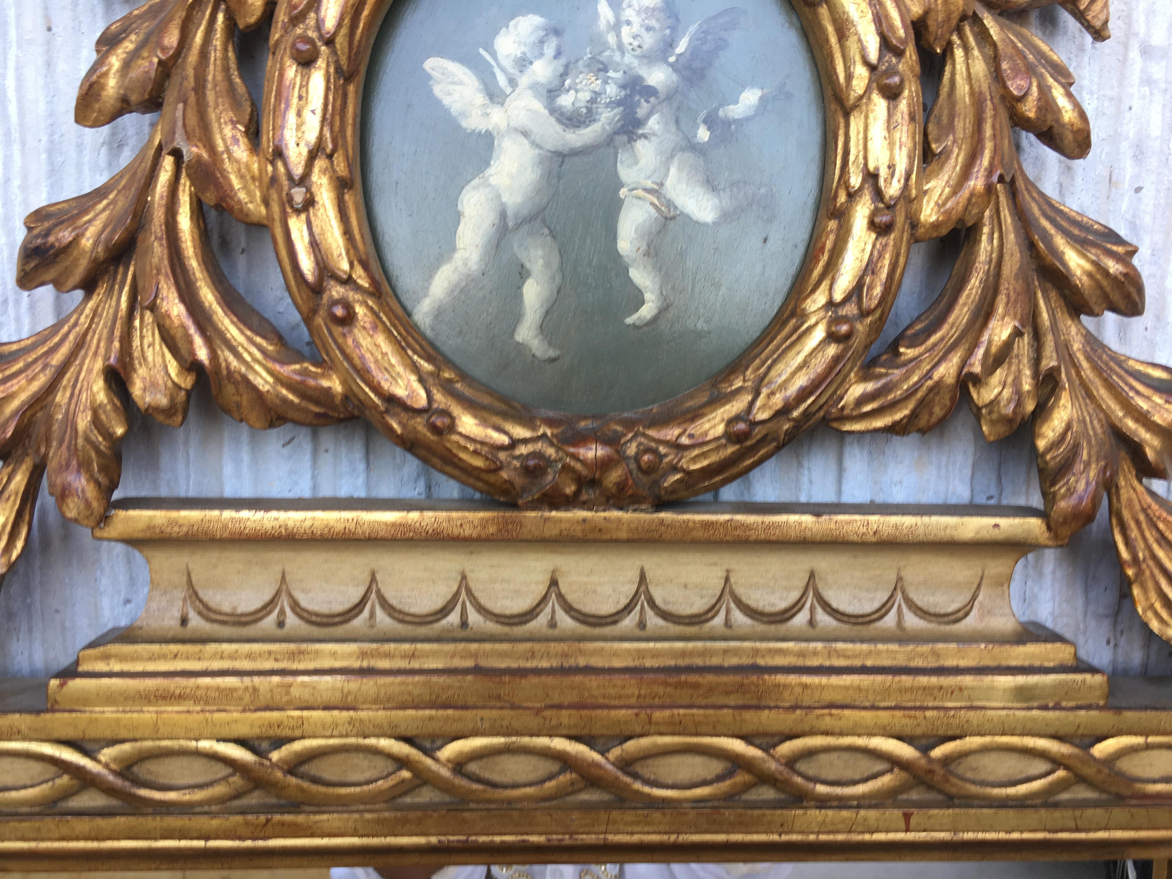 Giltwood 19th Century, French, Louis XVI Painted and Gilt Trumeau Mirror Depicting Cherub