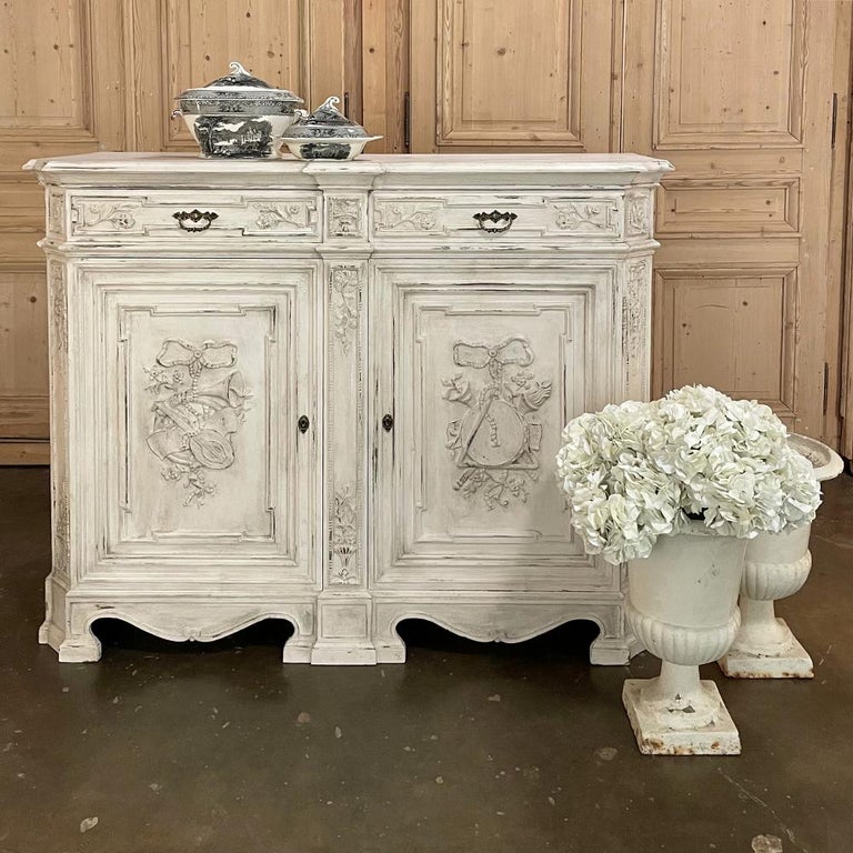 19th century French Louis XVI painted buffet is a splendid example of the neoclassical revival of the late 1800s, all rendered from solid old-growth white oak to beautify your home for centuries! Designed on an up-sized scale, it accommodates more