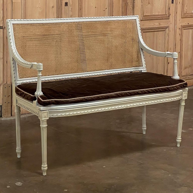 Hand-Carved 19th Century French Louis XVI Painted Canape with Cane & Cushion For Sale