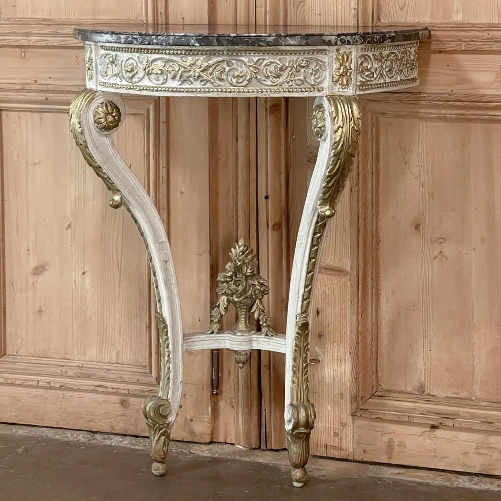 19th Century French Louis XVI painted marble top demilune console will make a beautiful accent for an entryway, hall or staircase! Resplendent with stunning architecture and embellishment that is the essence of the classical revival, it features bas