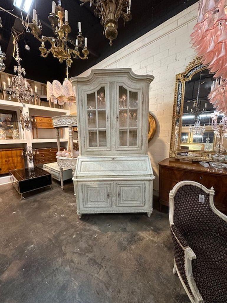 Lovely antique French Louis XVI painted secretarie. This piece has a very fine patina and nice clean lines. Top section has a nice area for display and there is a good amount of storage in the cabinet below. Gorgeous!!