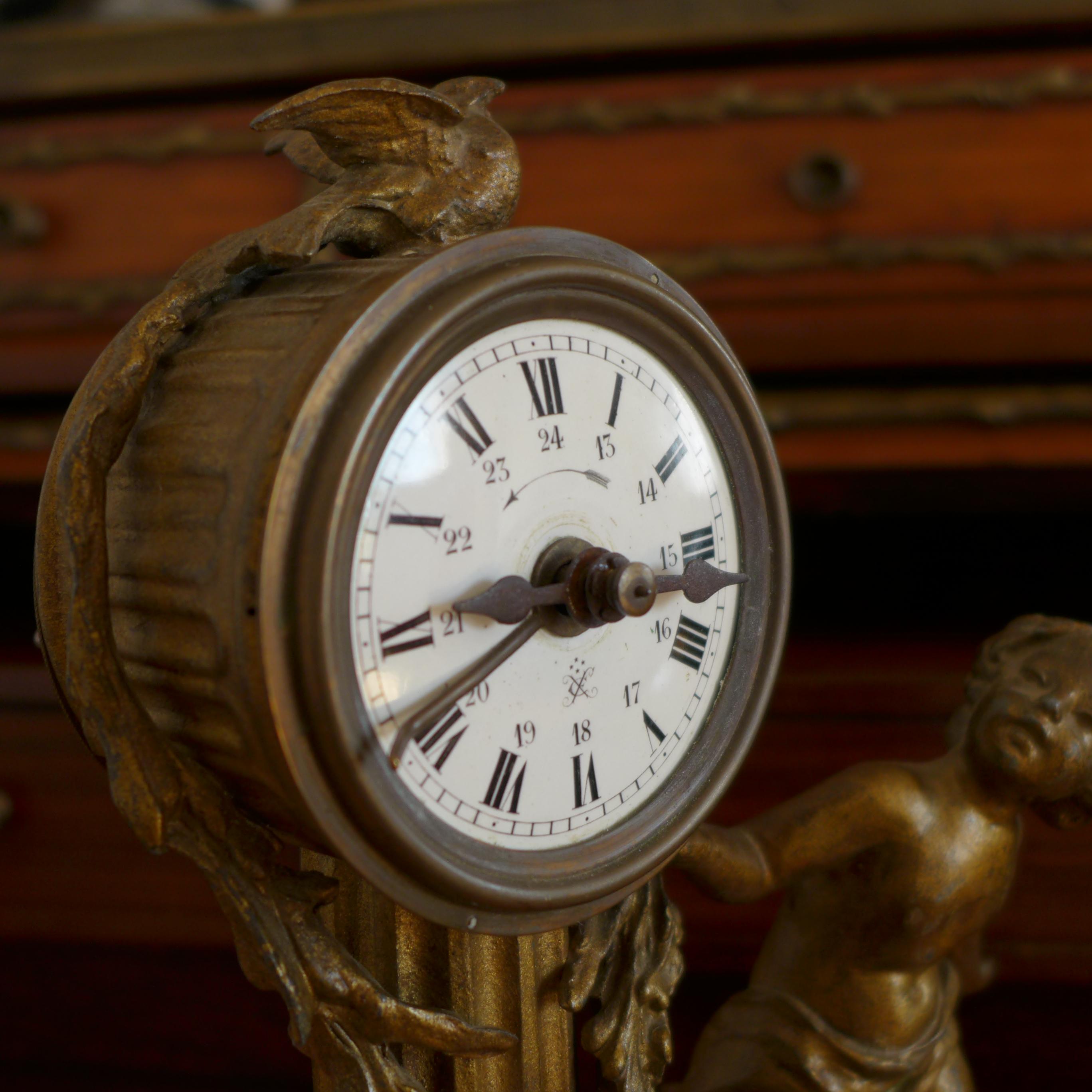 Bronze 19th Century French Louis XVI Patinated Desk Clock with a Figure of a Boy For Sale
