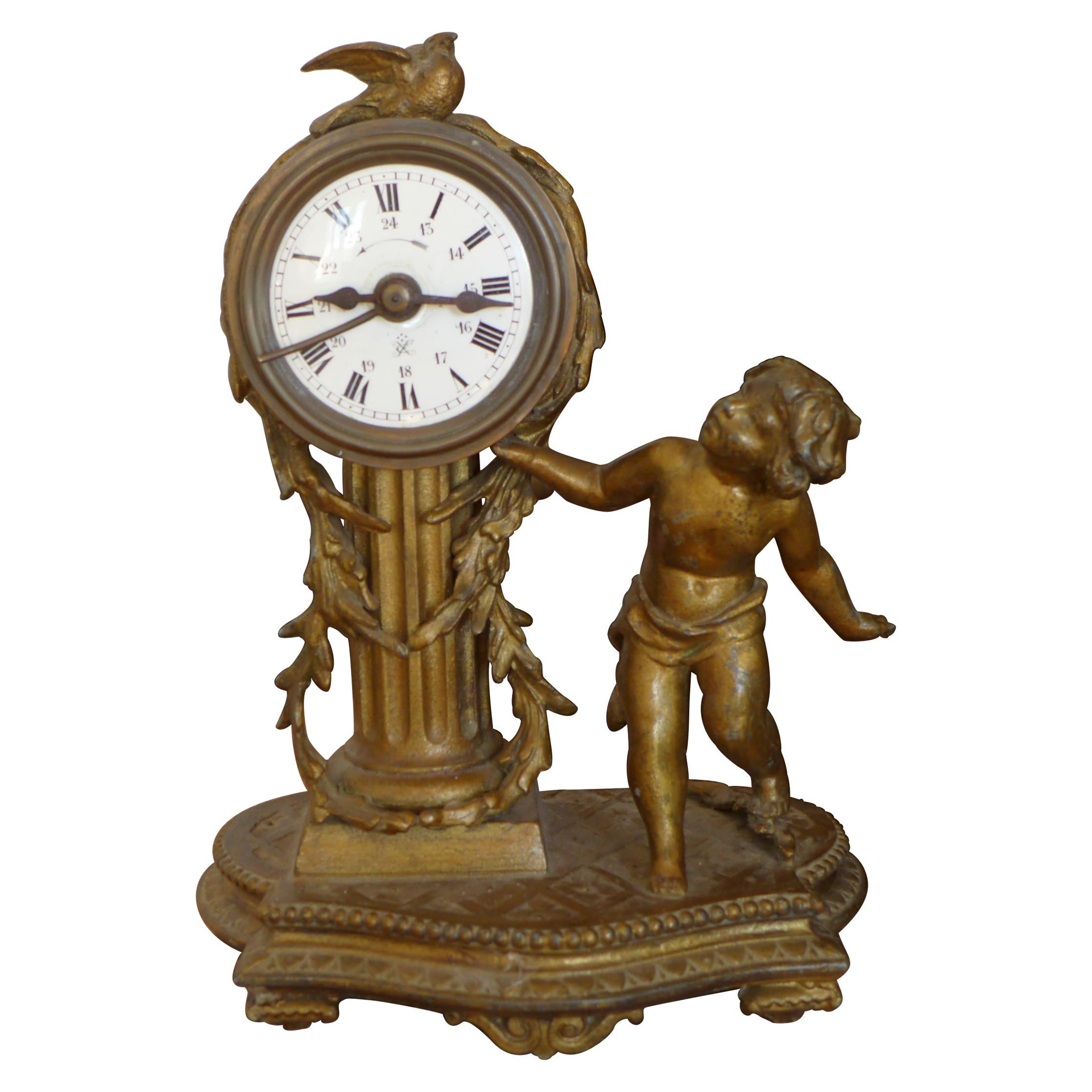 19th Century French Louis XVI Patinated Desk Clock with a Figure of a Boy For Sale