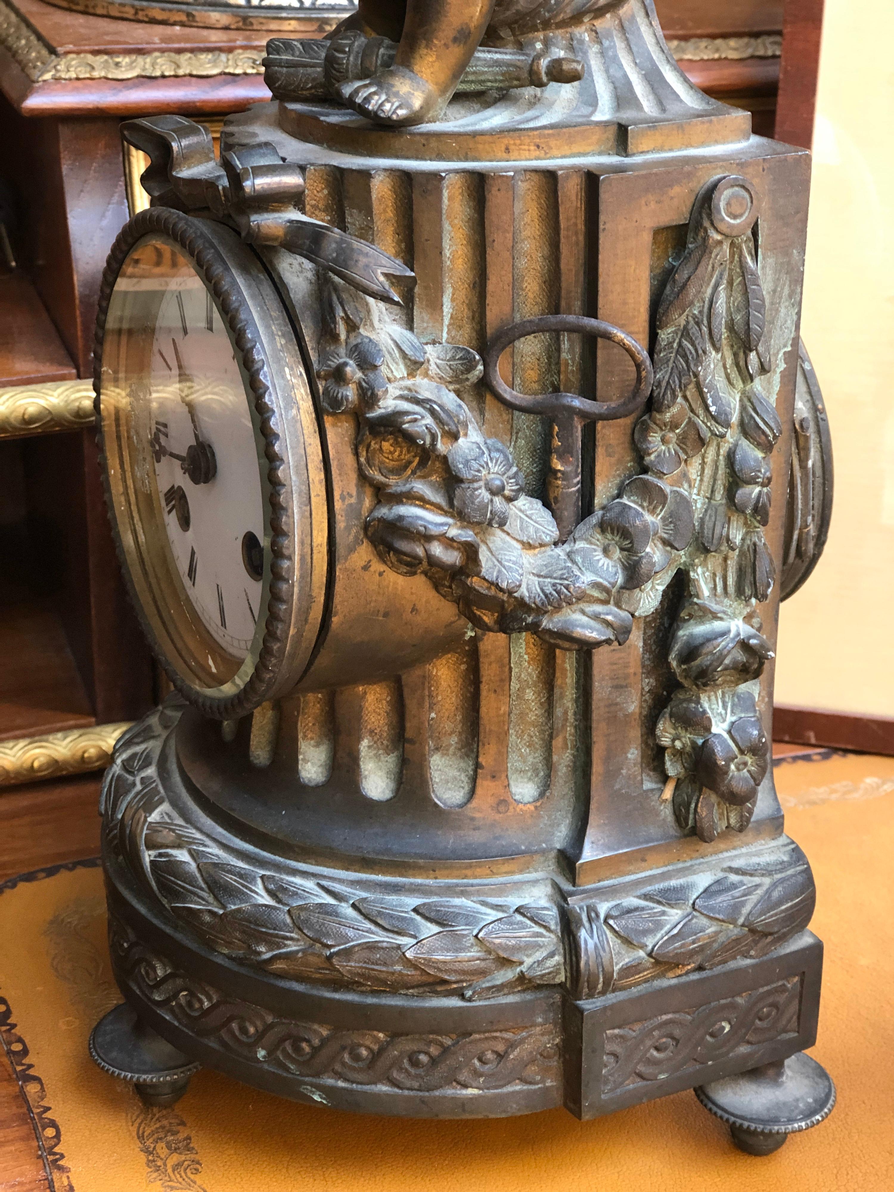 19th Century French Louis XVI Patinated Table Clock with a Figure of a Cupid In Good Condition For Sale In Sofia, BG