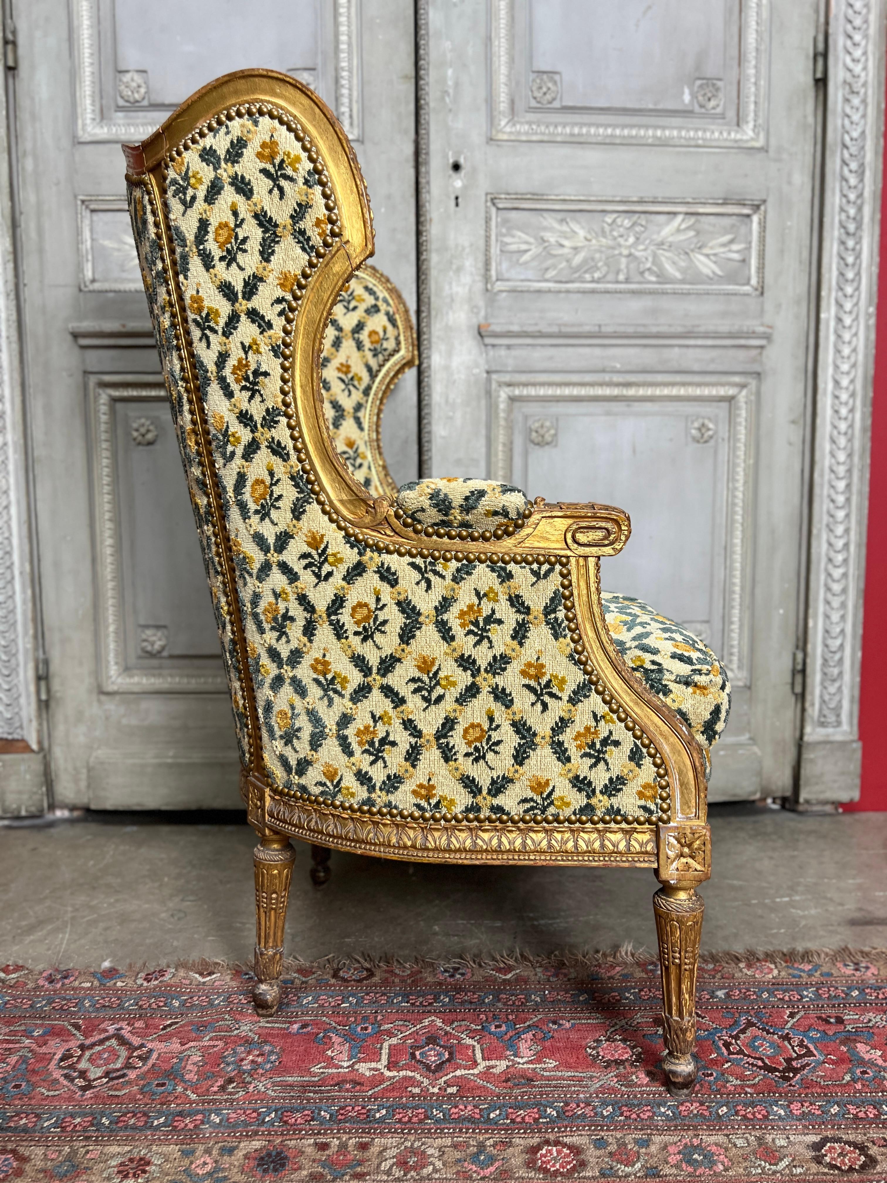 Carved 19th Century French Louis XVI Style Bergere in Gilt Finish.   For Sale