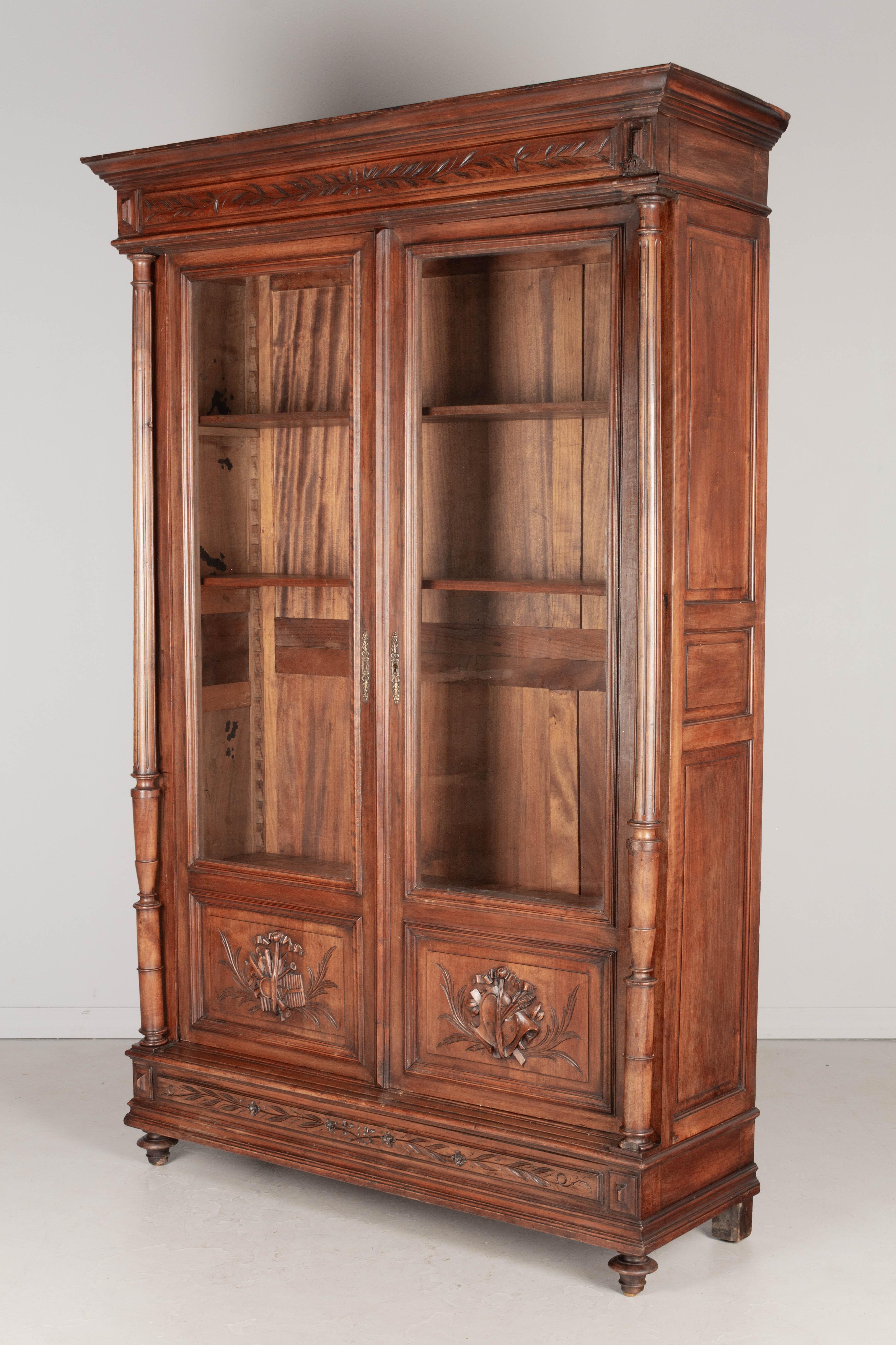 Hand-Carved 19th Century French Louis XVI Style Bibliotheque or Bookcase For Sale