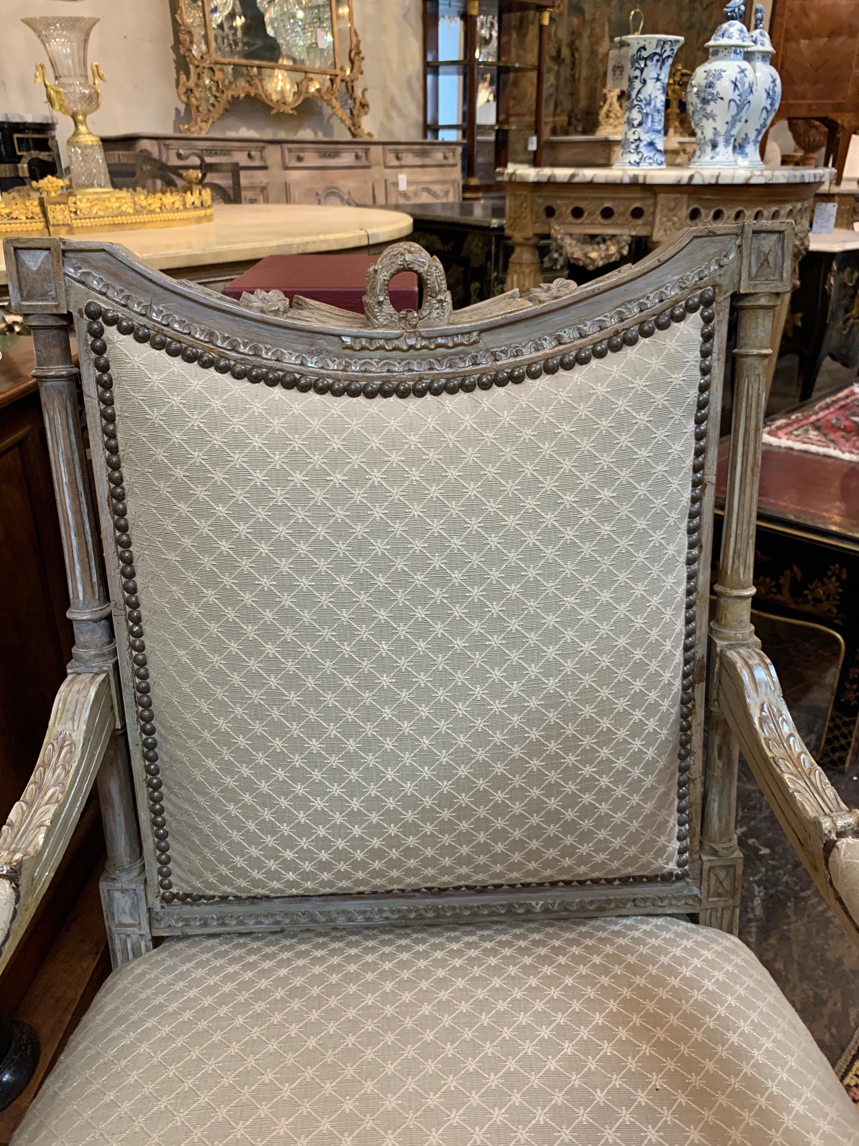 Very fine 19th century French Louis XVI style carved and painted armchair. Note the beautiful carvings. And the piece is upholstered in a pretty crème and beige fabric.
Comfortable as well!