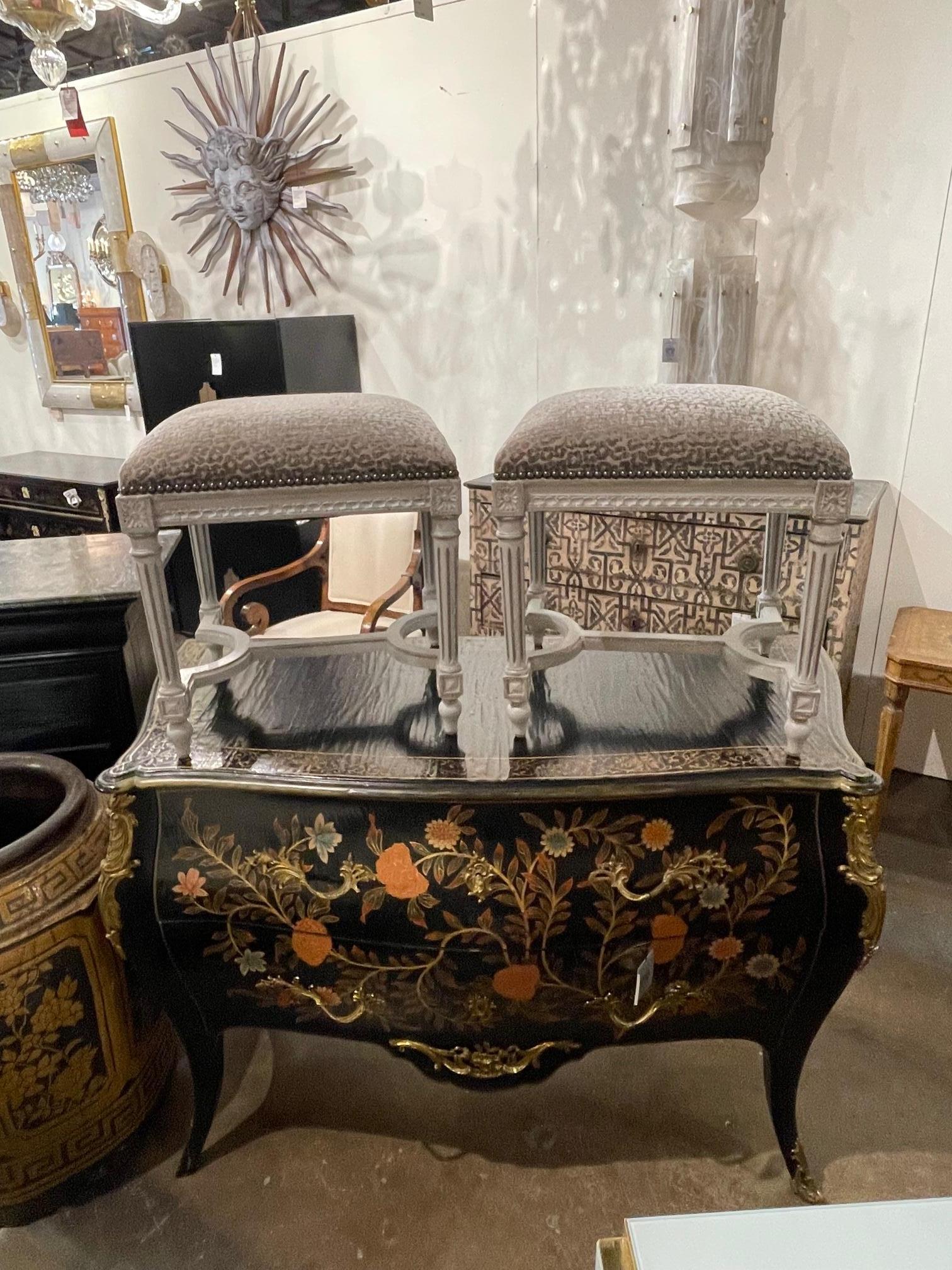 Lovely Louis XVI upholstered benched with tan and creme animal print fabric. The benches also have very nice carvings and are painted with a white-wash finish. Beautiful! Note: price listed is per item.