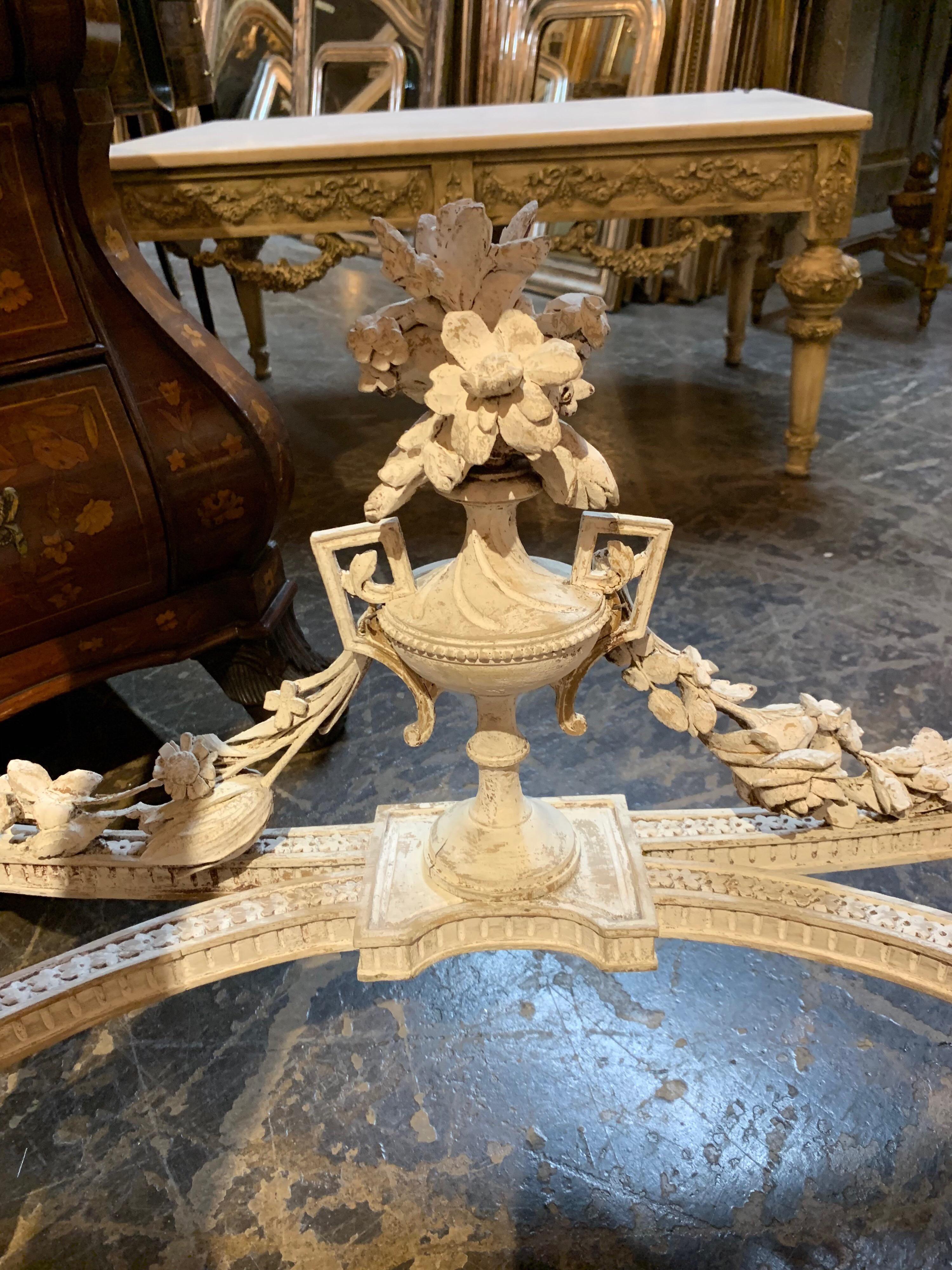 Gorgeous 19th century French Louis XVI style carved and painted demilune table.
Exquisite carvings and beautiful marble top as well. A very impressive piece.