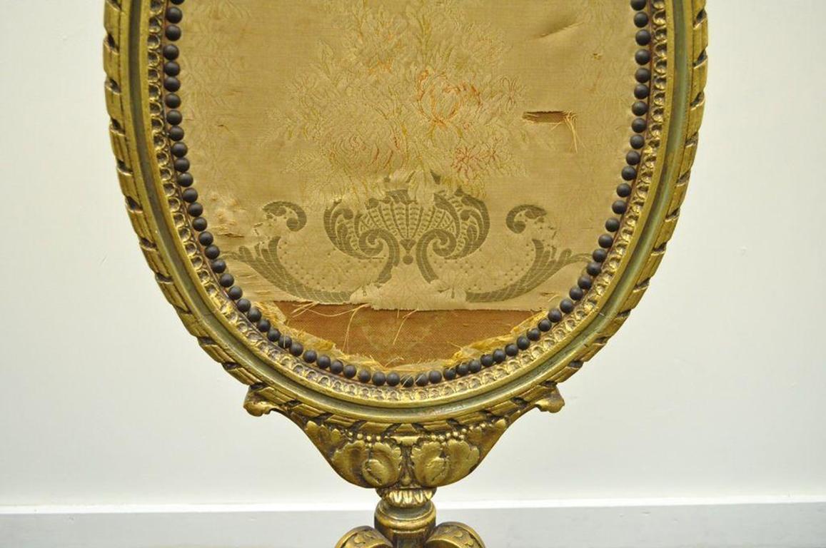 18th Century 19th Century French Louis XVI Style Carved Giltwood Oval Fireplace Screen For Sale