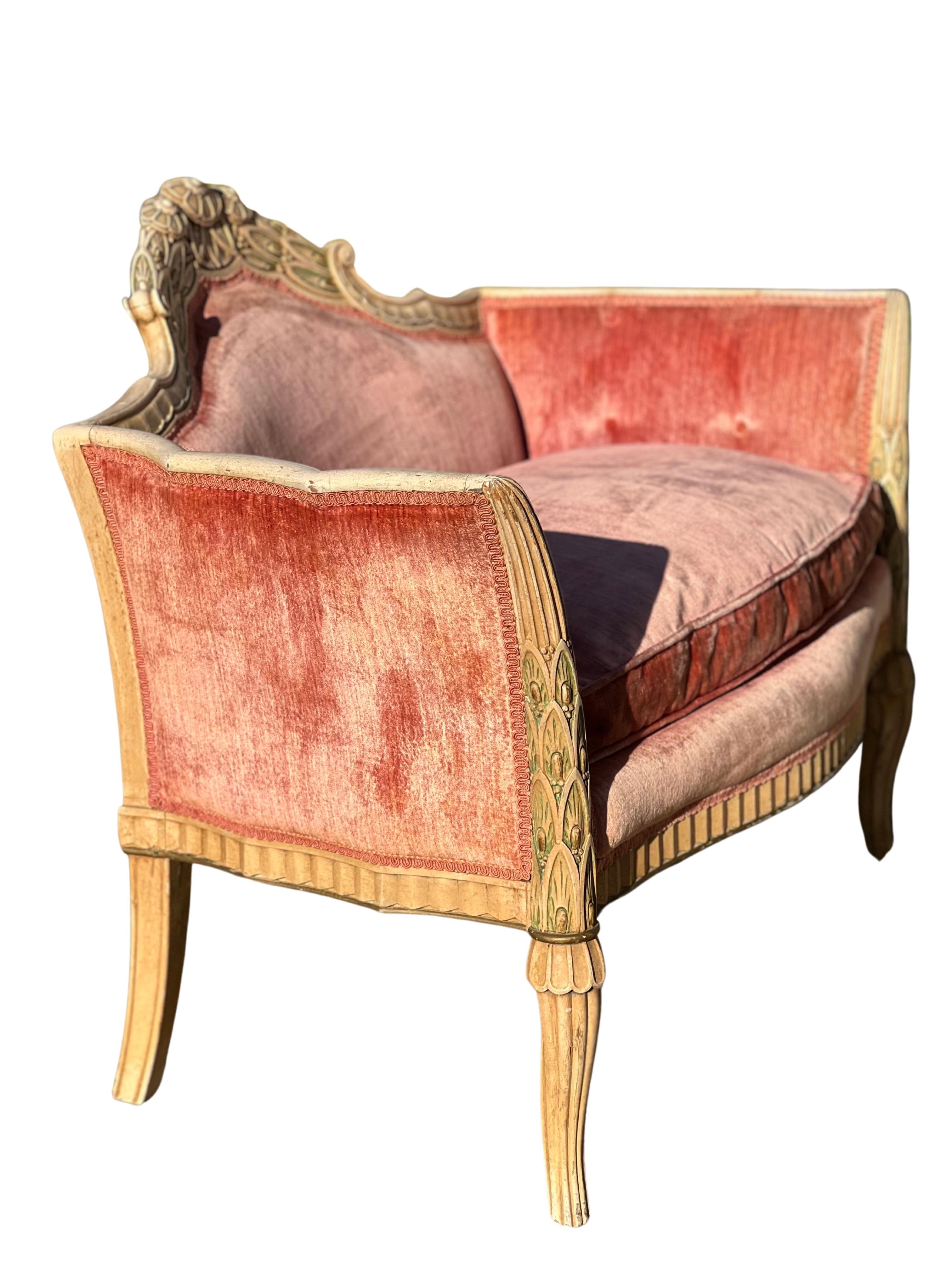 Wonderful 19th century French Louis XVI style settee.

Inspired by French forms of the baroque period, the settee has beautifully carved wood detail throughout. The carved leaf and floral detail on the back crest and sides is superb. Lovely design