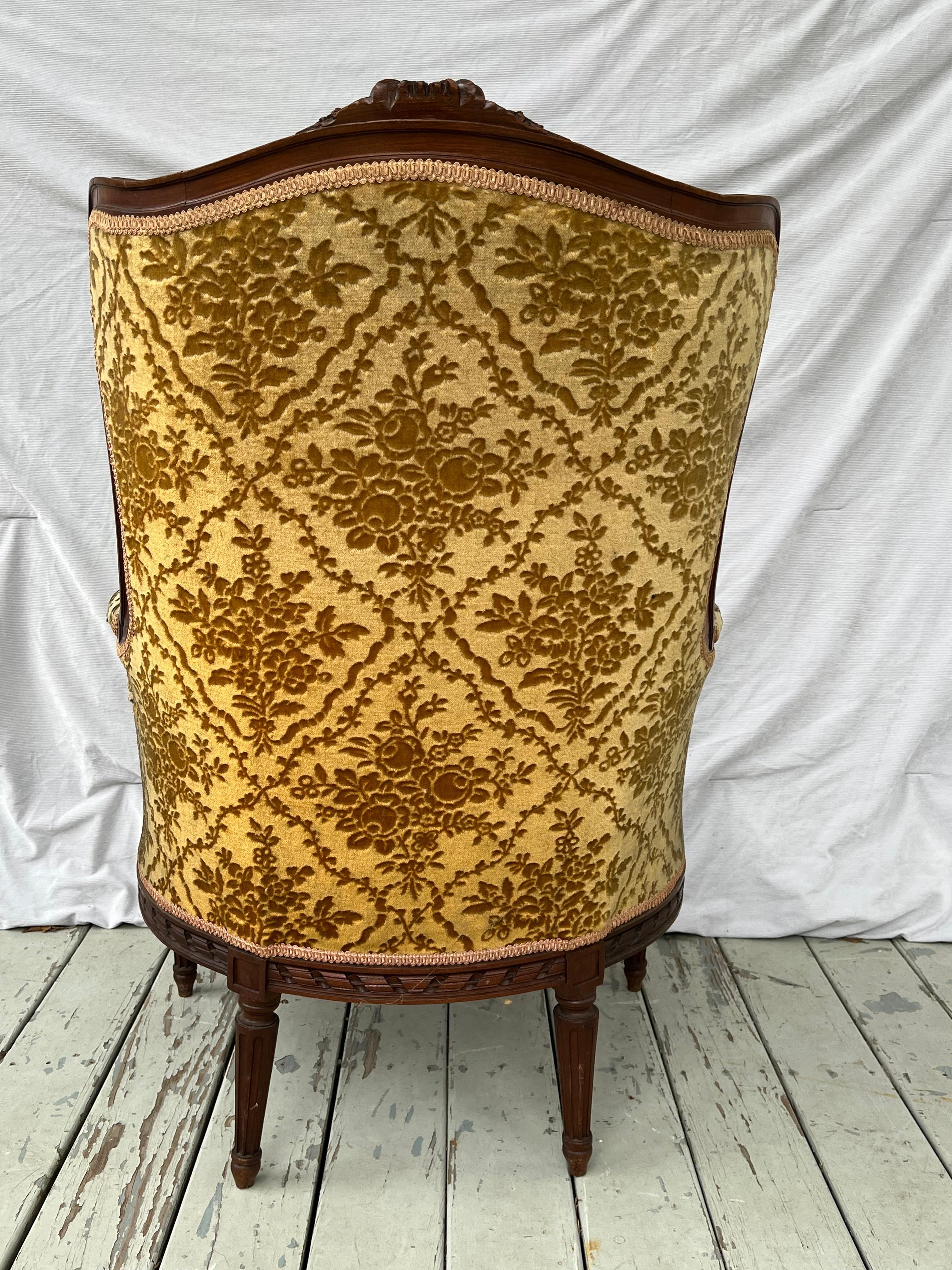 19Th Century French Louis XVI Style Carved Walnut Bergere Chair For Sale 1