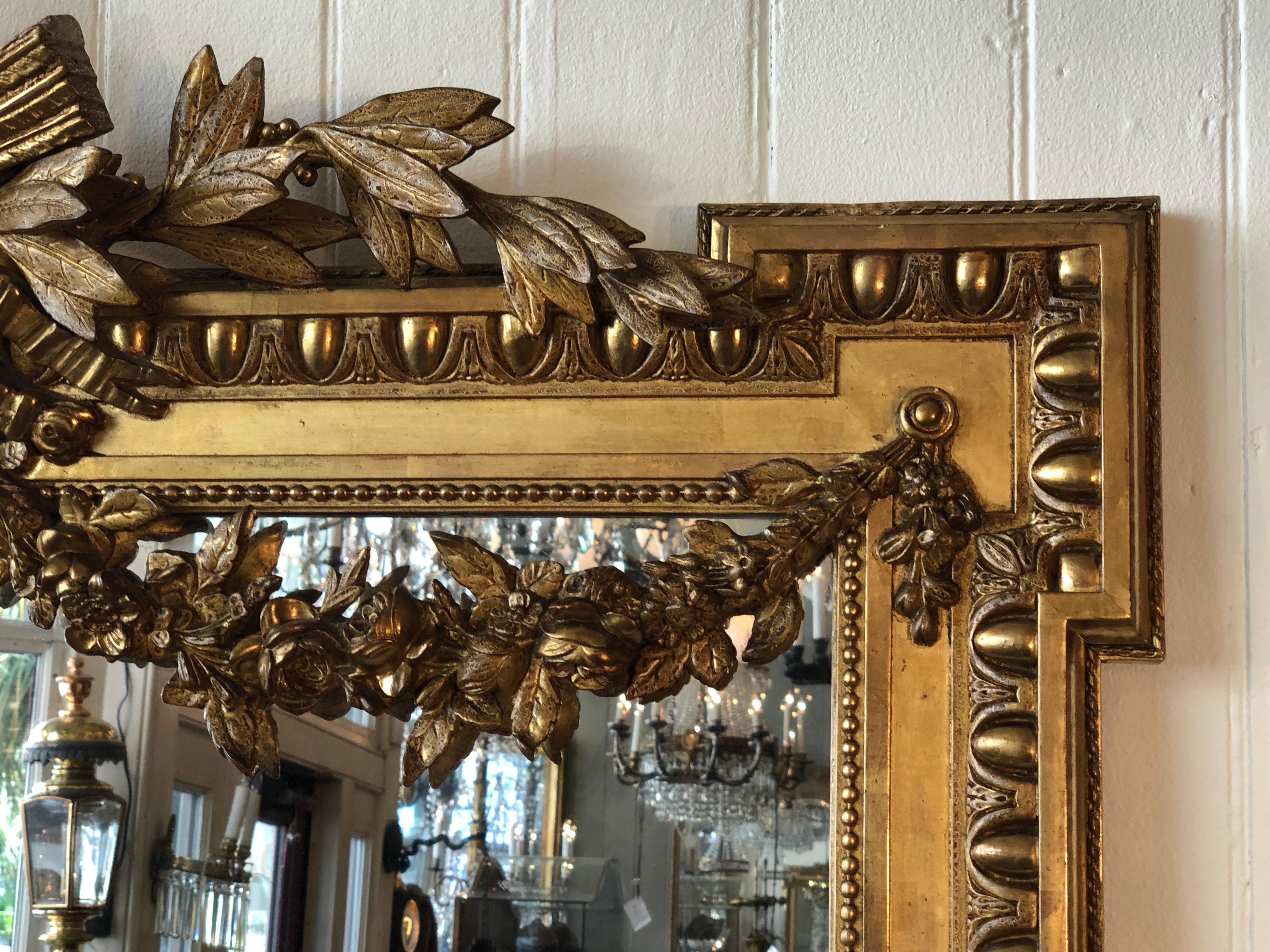 Carved 19th Century French Louis XVI Style Gilded Mirror For Sale