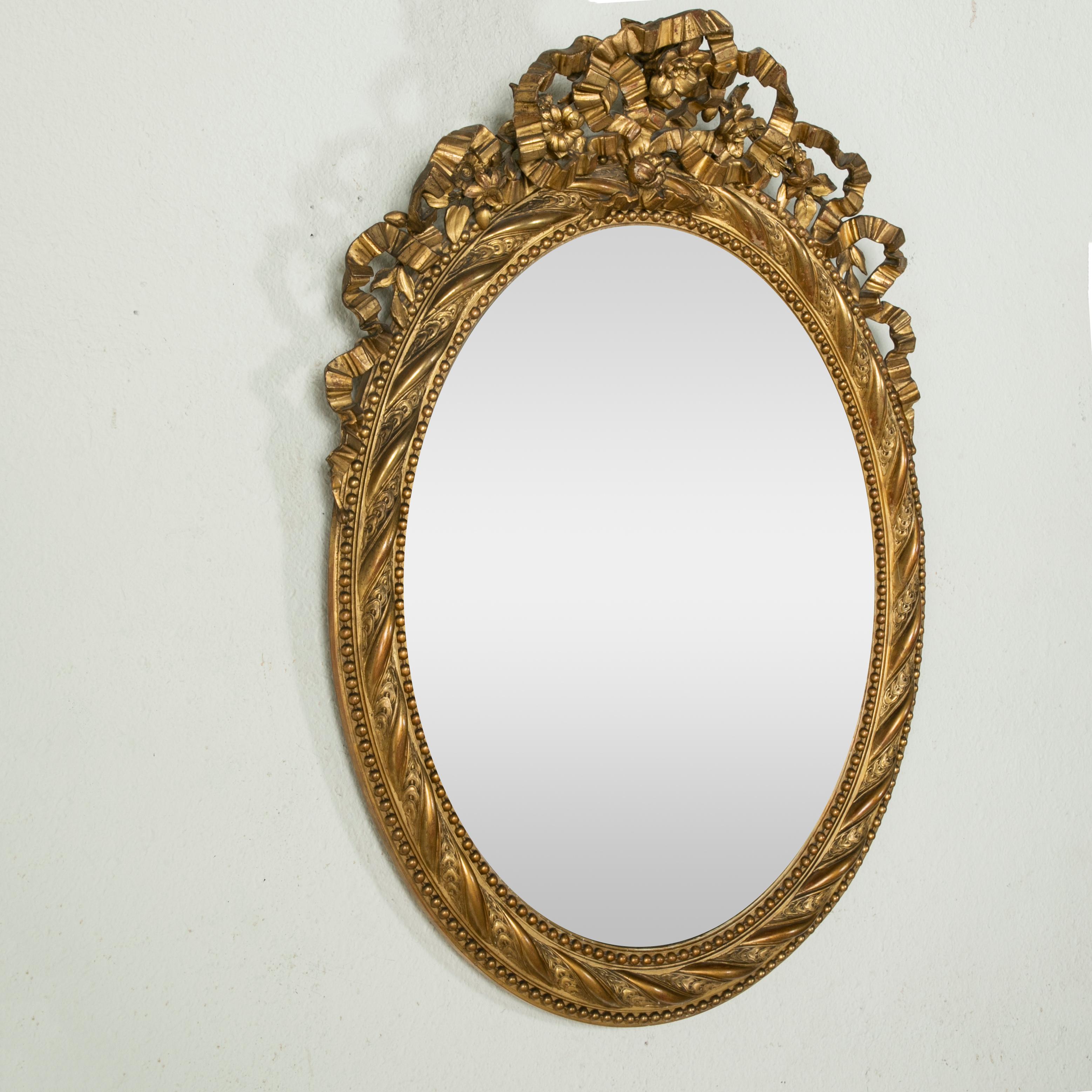 19th Century French Louis XVI Style Gilt Wood Oval Mirror with Knotted Ribbon In Good Condition In Fayetteville, AR