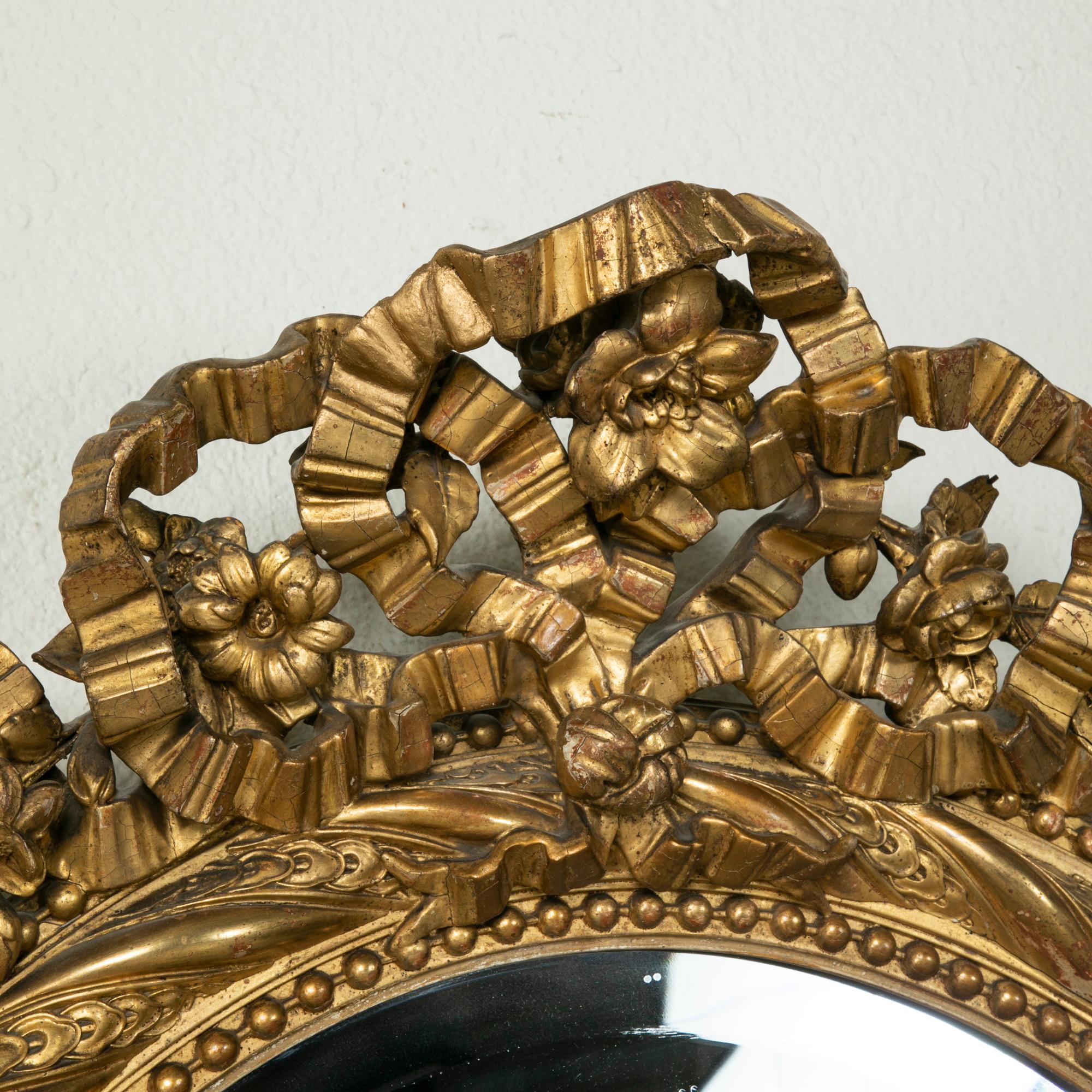 19th Century French Louis XVI Style Gilt Wood Oval Mirror with Knotted Ribbon 1