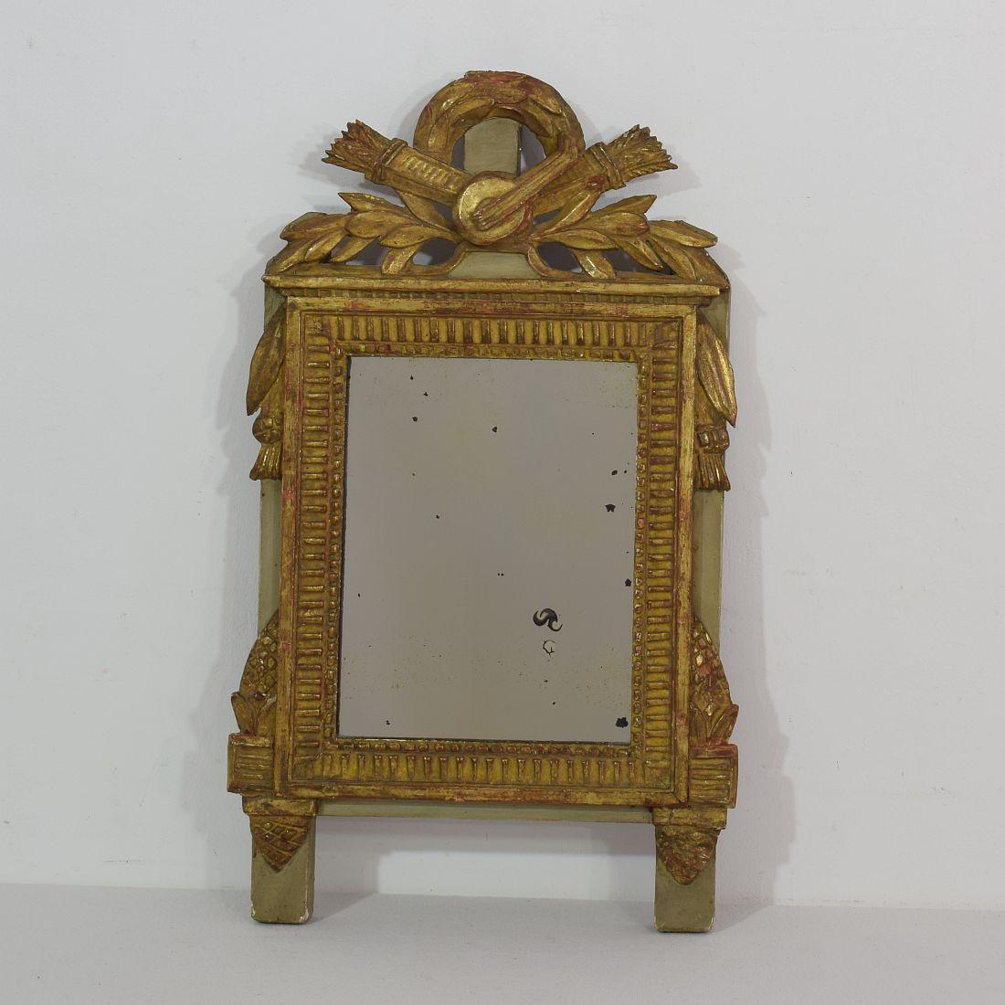 Very nice Louis XVI style giltwood mirror with original mirror glass.
France, 19th century. Weathered, losses and old repairs.


  