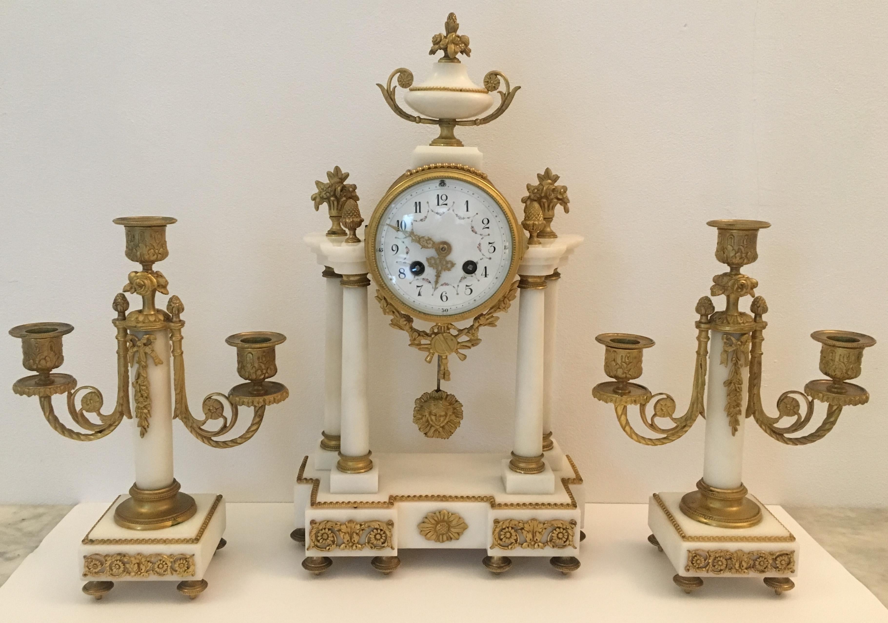 Bronze 19th Century French Louis XVI Style Ormolu and White Marble Boudoir Clock Set For Sale