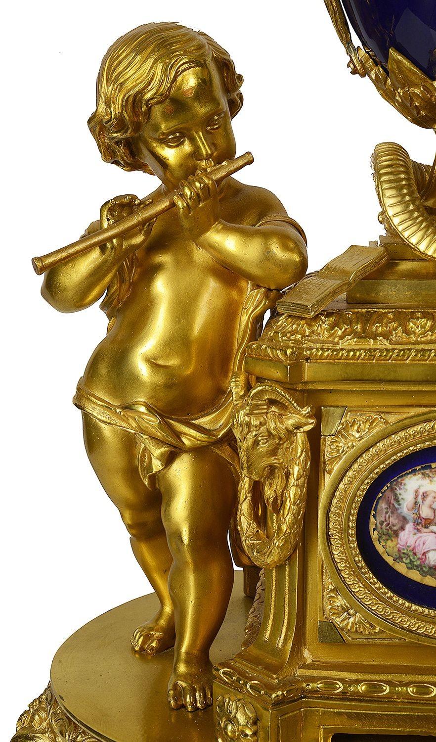 Gilt 19th Century French Louis XVI Style Revolving Mantel Clock For Sale