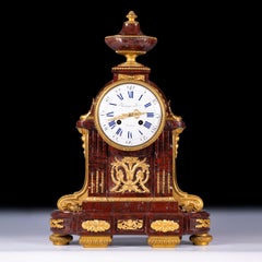 19th century French Louis XVI style Rouge Marble Mantle Clock by Raingo Frères