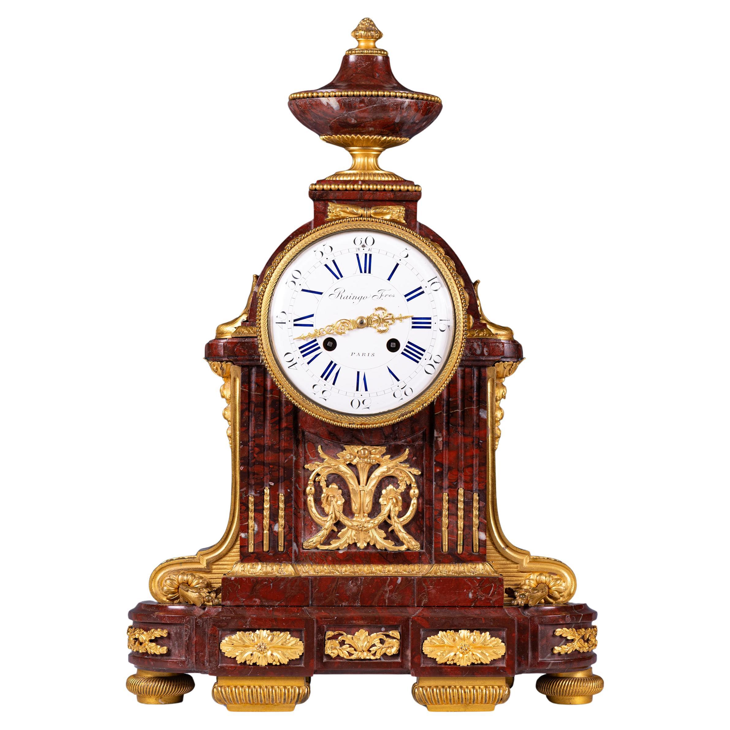 19th century French Louis XVI style Rouge Marble Mantle Clock by Raingo Frères