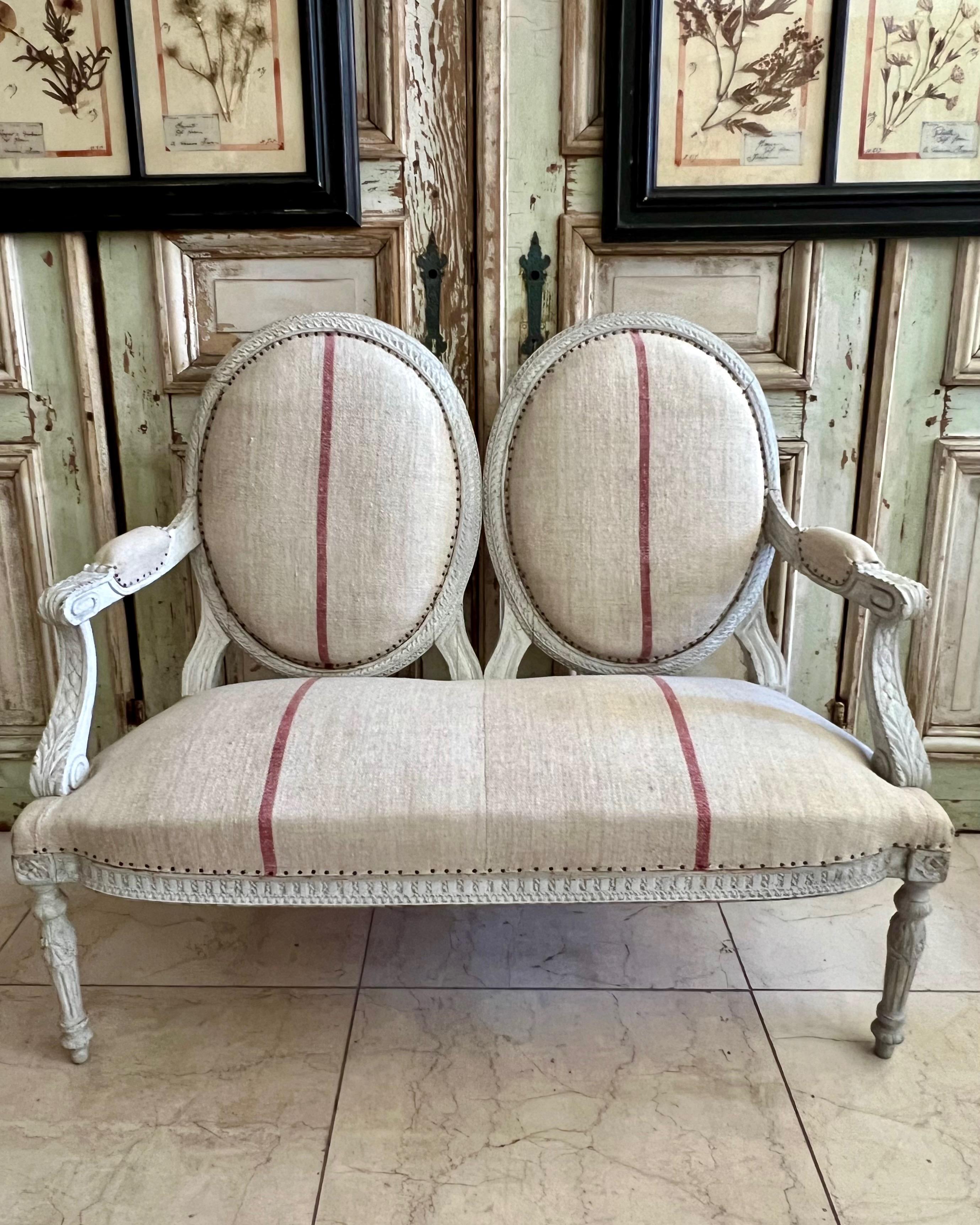 Hand-Carved 19th century French Louis XVI Style Settee For Sale