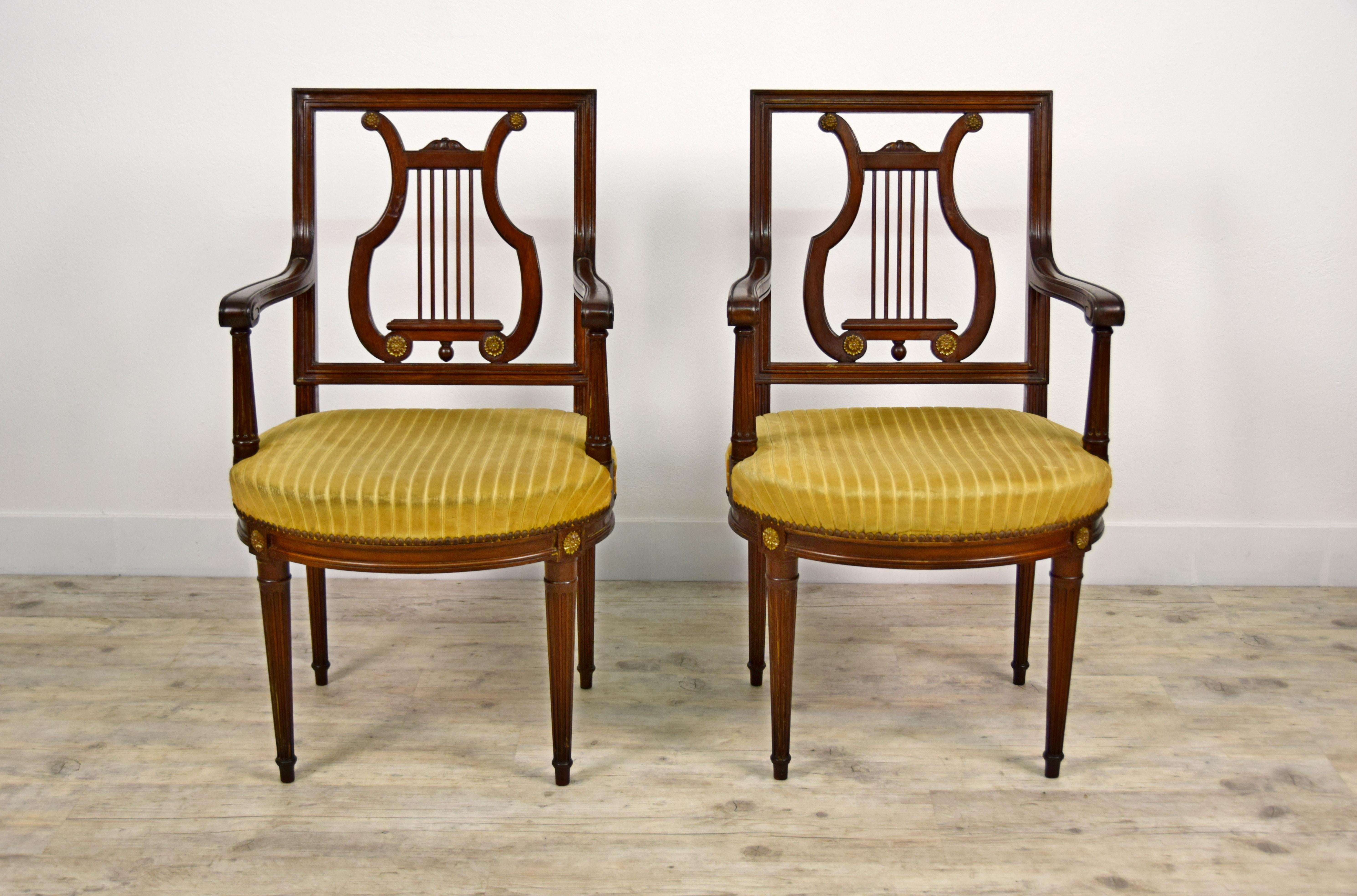 19th century, French Louis XVI style six wood chairs and two wood armchairs 
France, late 19th century

Size: chairs, cm H back 90, seat height 46 x W 44 x D 50; armchairs, H back 94 x seat height 46 x W 56 x D 60

The six chairs and two