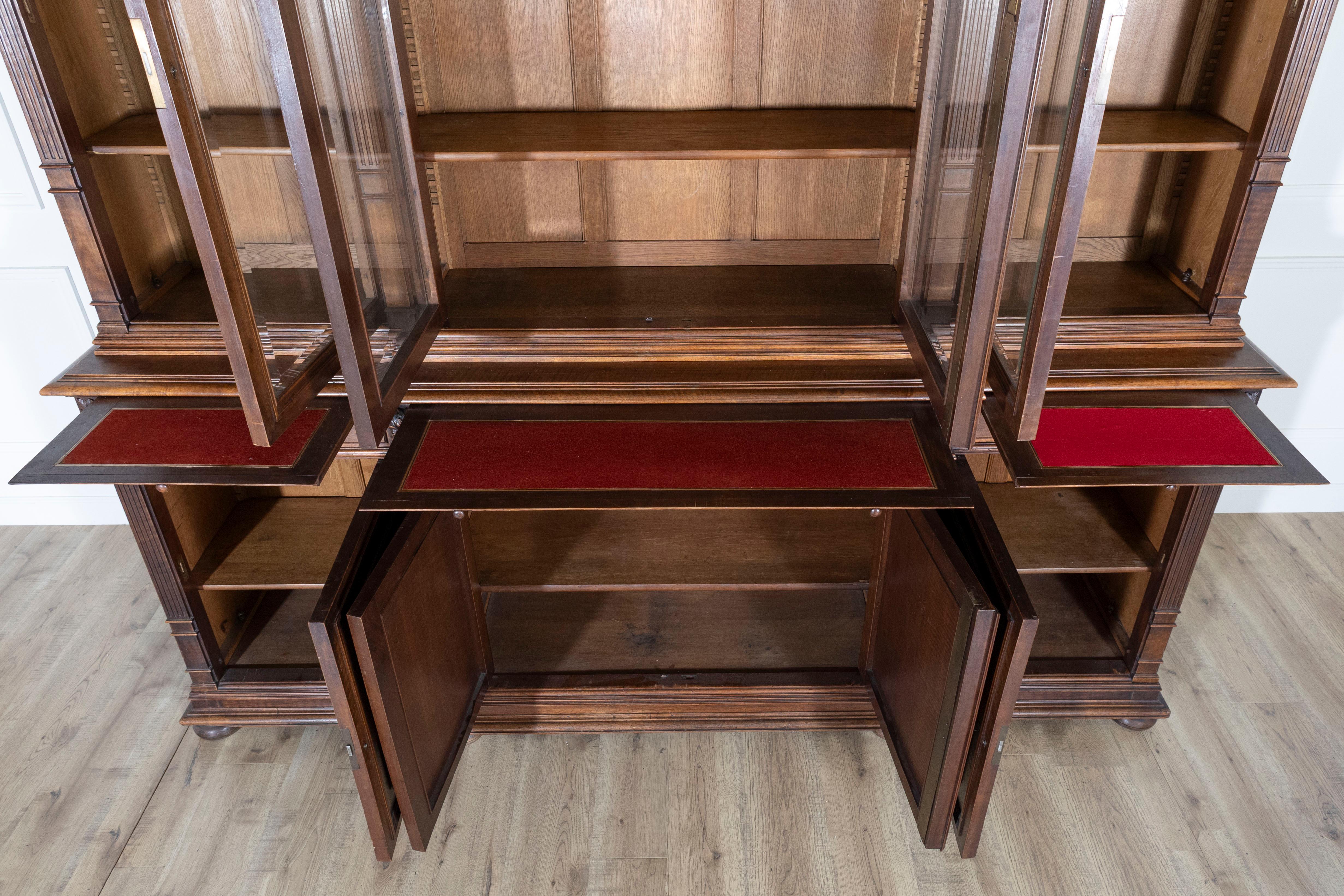 Stained 19th Century French Louis XVI Style Walnut 8-Door Bookcase For Sale