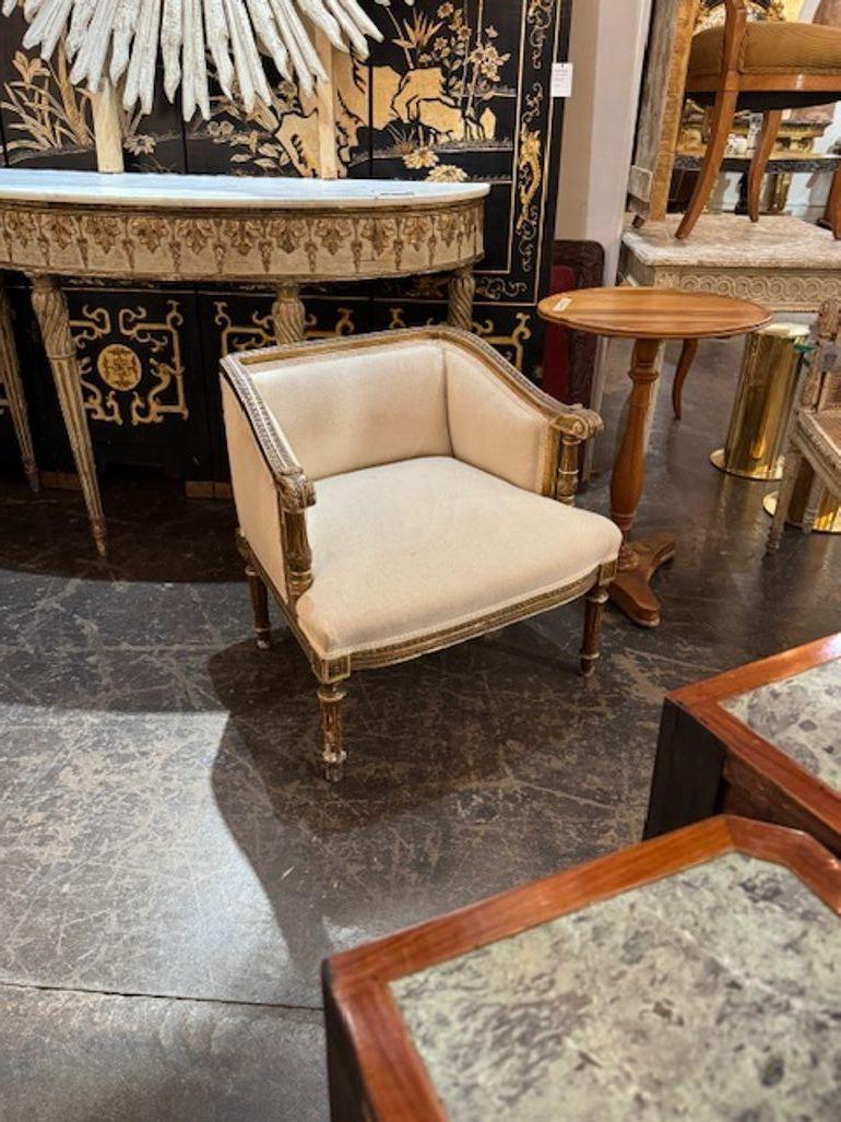 Late 19th century French Louis XVI carved and giltwood vanity low chair. Circa 1890. A timeless and classic touch for a fine interior. 27w x 24d x 26h