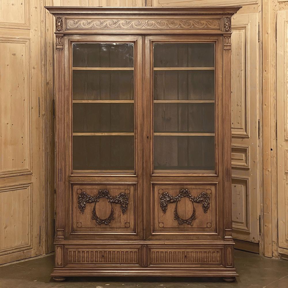 Hand-Carved 19th Century French Louis XVI Walnut Bookcase For Sale