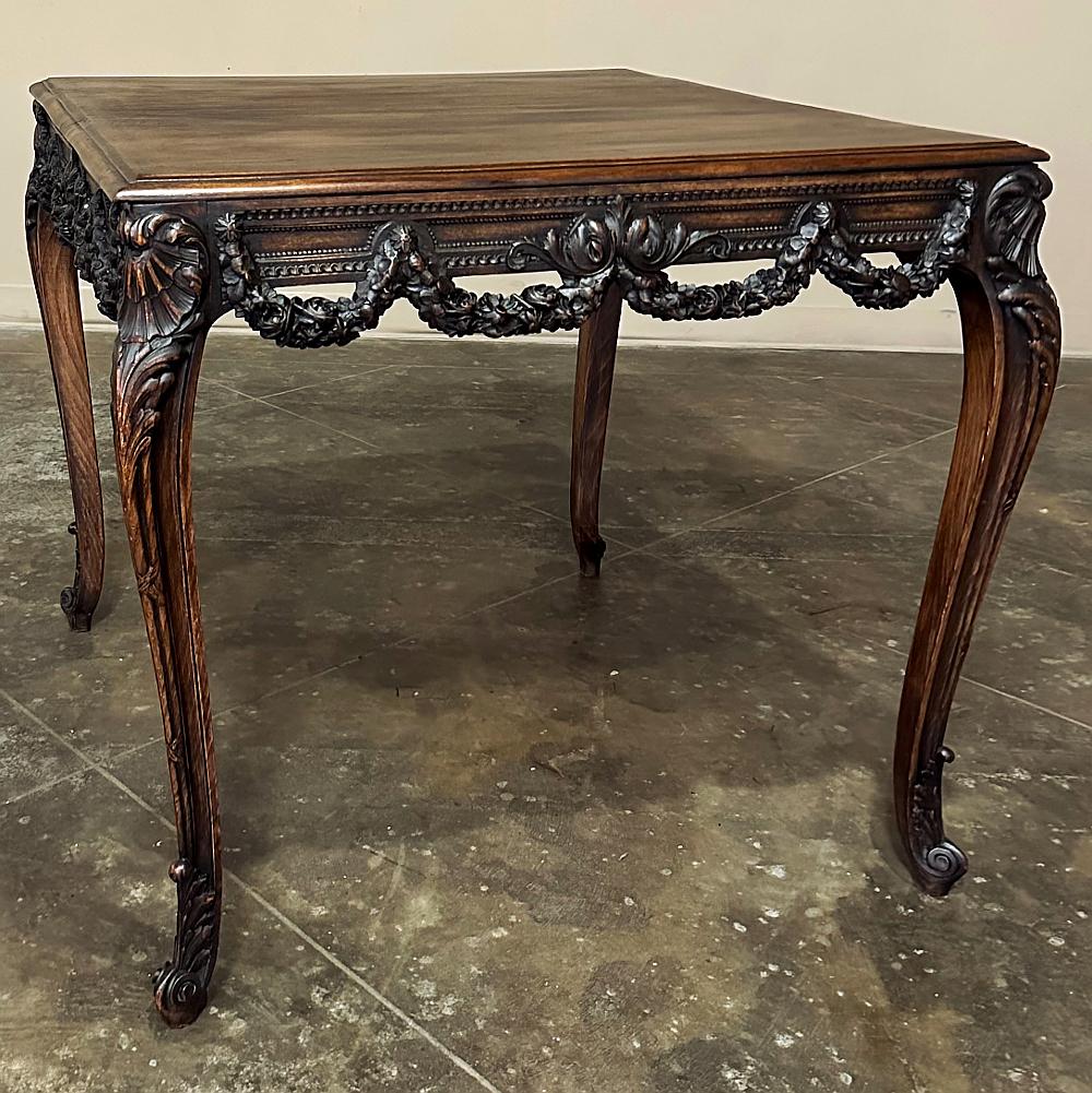 19th century French Louis XVI Walnut End Table ~ Center Table is a neoclassical master work of the wood sculptor's art! Carved on all four sides in an almost square format, it features luxurious French walnut that is displayed for all to admire