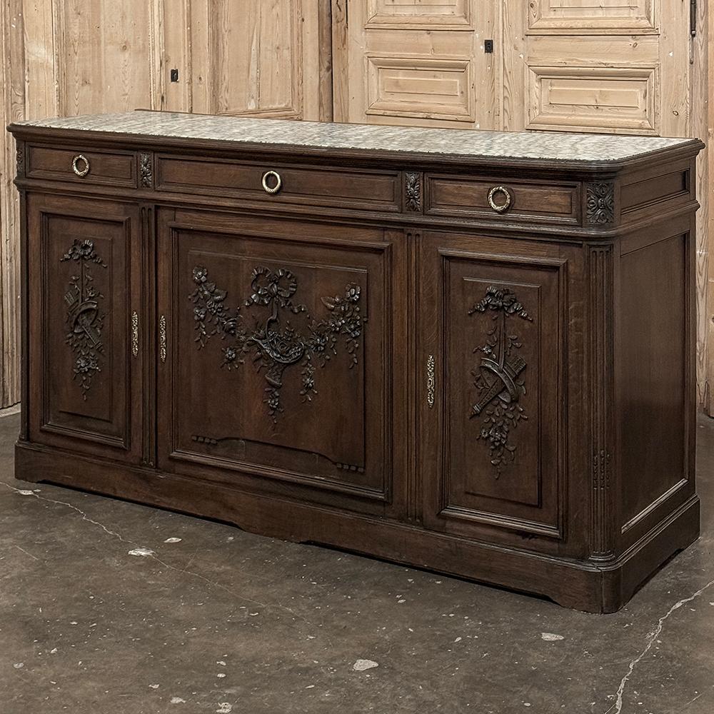 19th Century French Louis XVI Walnut Marble Top Buffet ~ Credenza is a splendid example of neoclassical architecture inspired by the ancient Greek and Roman masters, combined with the meticulous attention to detail for which the French are so well