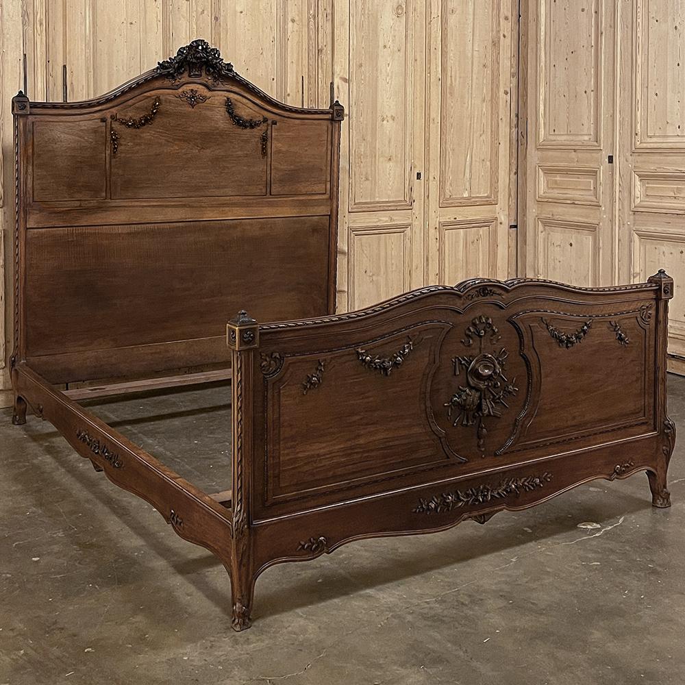 19th Century French Louis XVI walnut queen bed is an exceptional example of the sublime furniture crafted during the waning years of the Belle Epoque that helped make Paris the center for the finest furniture ~ most experts agree ~ that the world