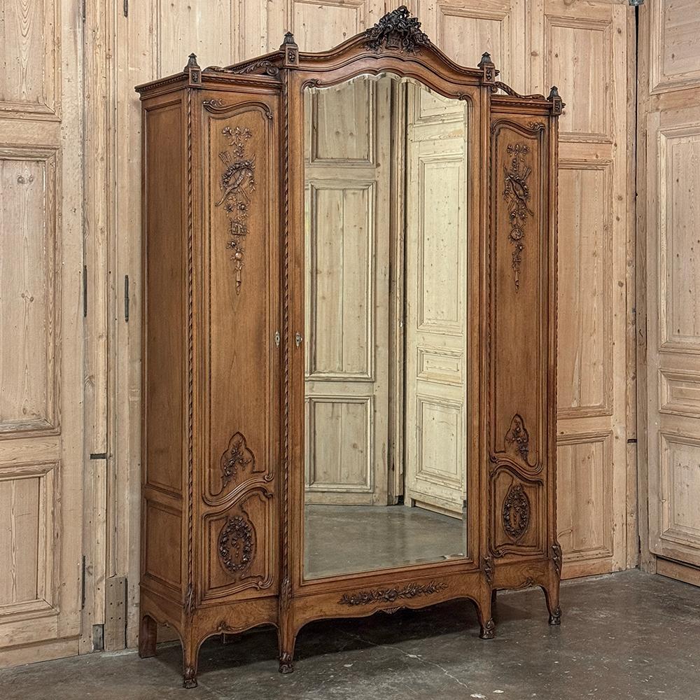 Beveled 19th Century French Louis XVI Walnut Triple Armoire For Sale