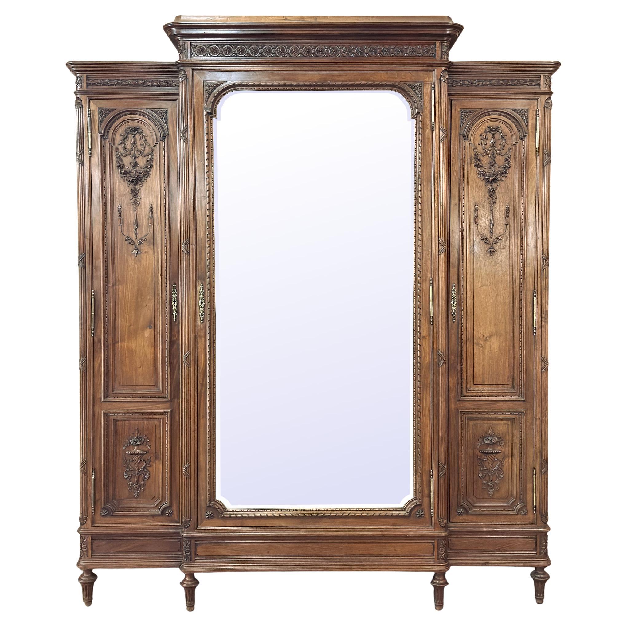 19th Century French Louis XVI Walnut Triple Armoire