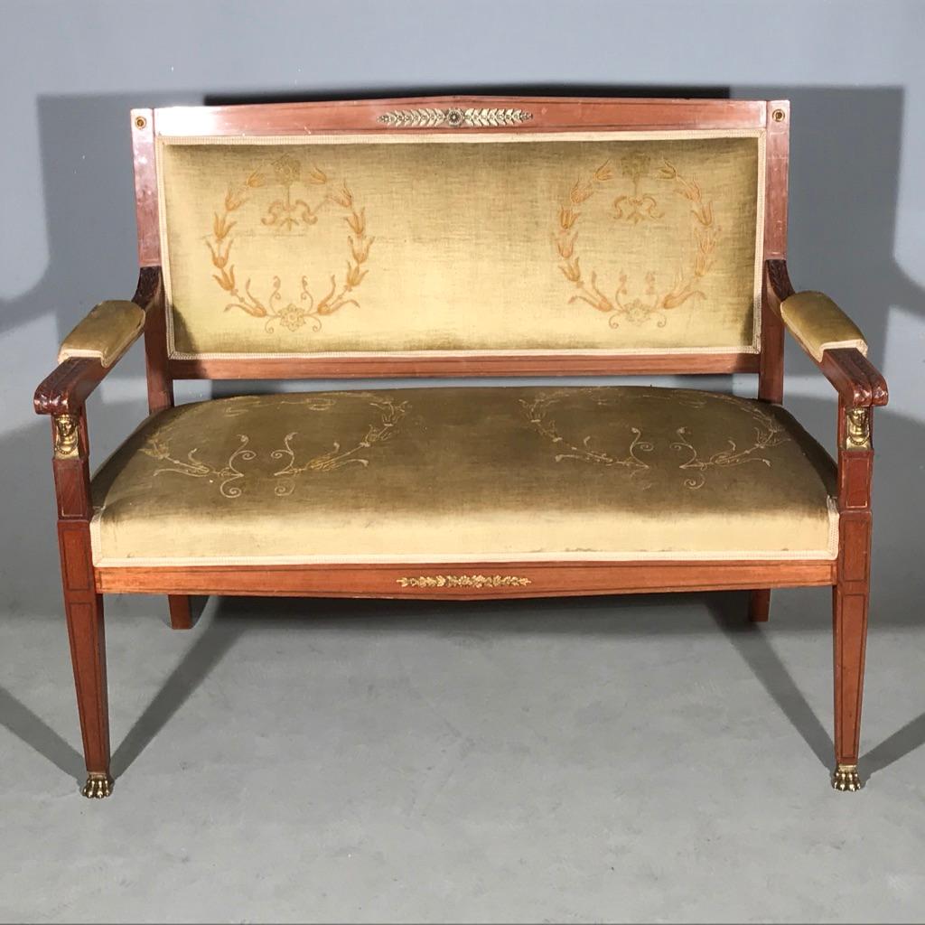 Super quality French mahogany Empire style 2-seat sofa with very good brass mounts and further brass banded inlay running throughout the frame.
This is a neat size, but is comfortable for two adults to sit on, perhaps not all evening, but certainly