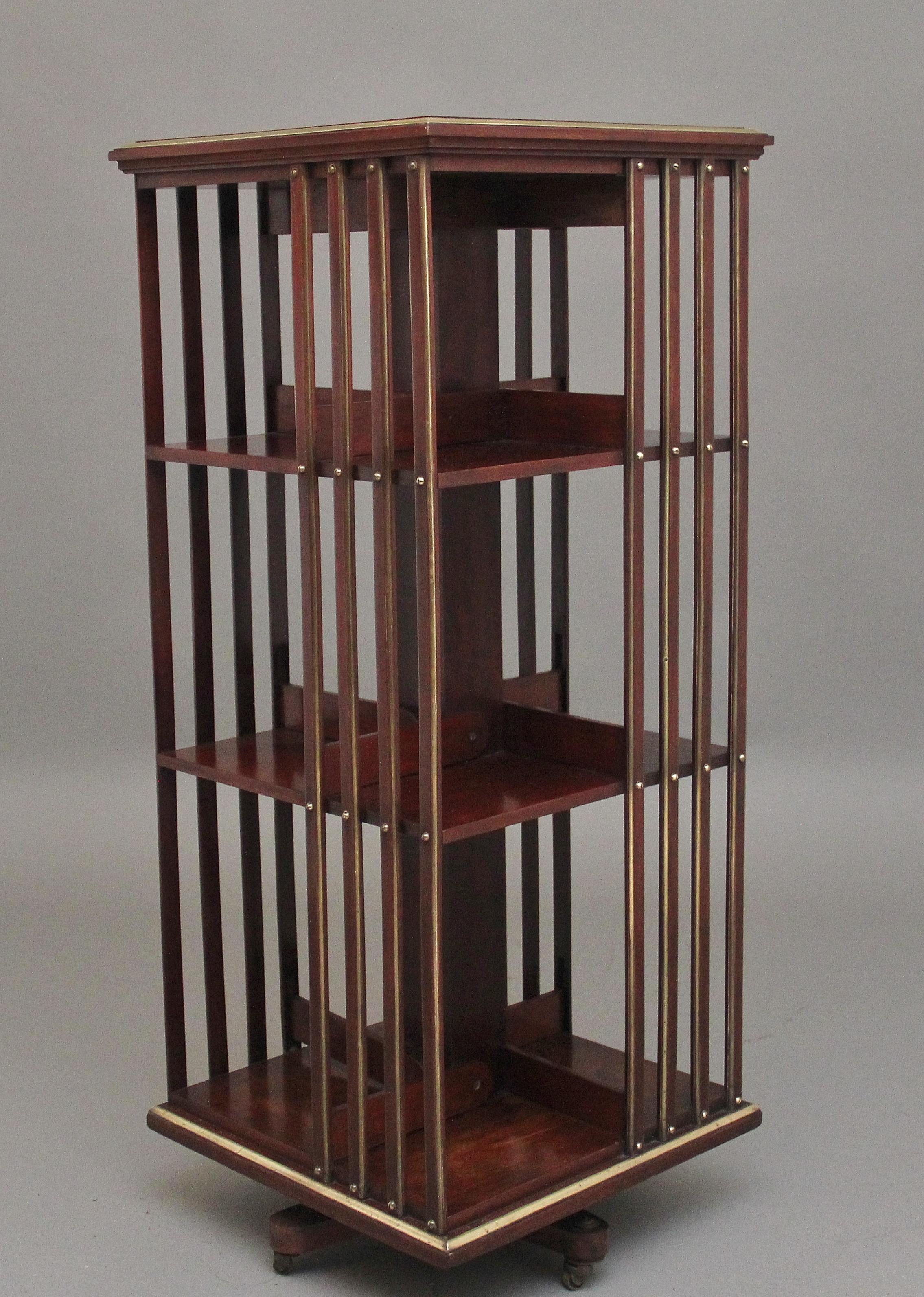 Brass 19th Century French mahogany and brass revolving bookcase