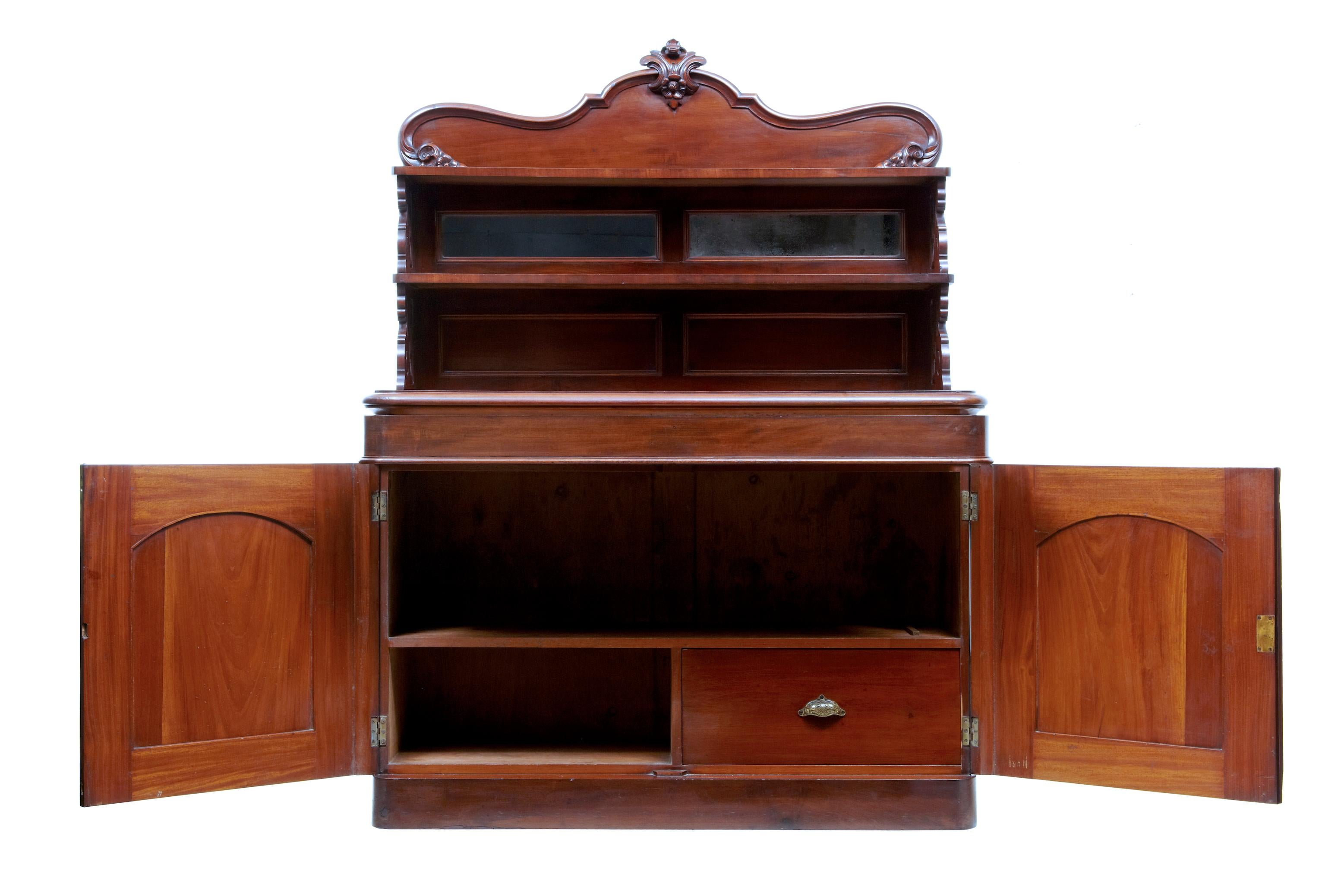 19th century French mahogany chiffonier sideboard circa 1880.

Chiffonier with Aesthetic Movement influences, made in rich mahogany.

Comprising of 2 sections. The top section with carved ornate gallery and shelf, below which 2 small mirrors