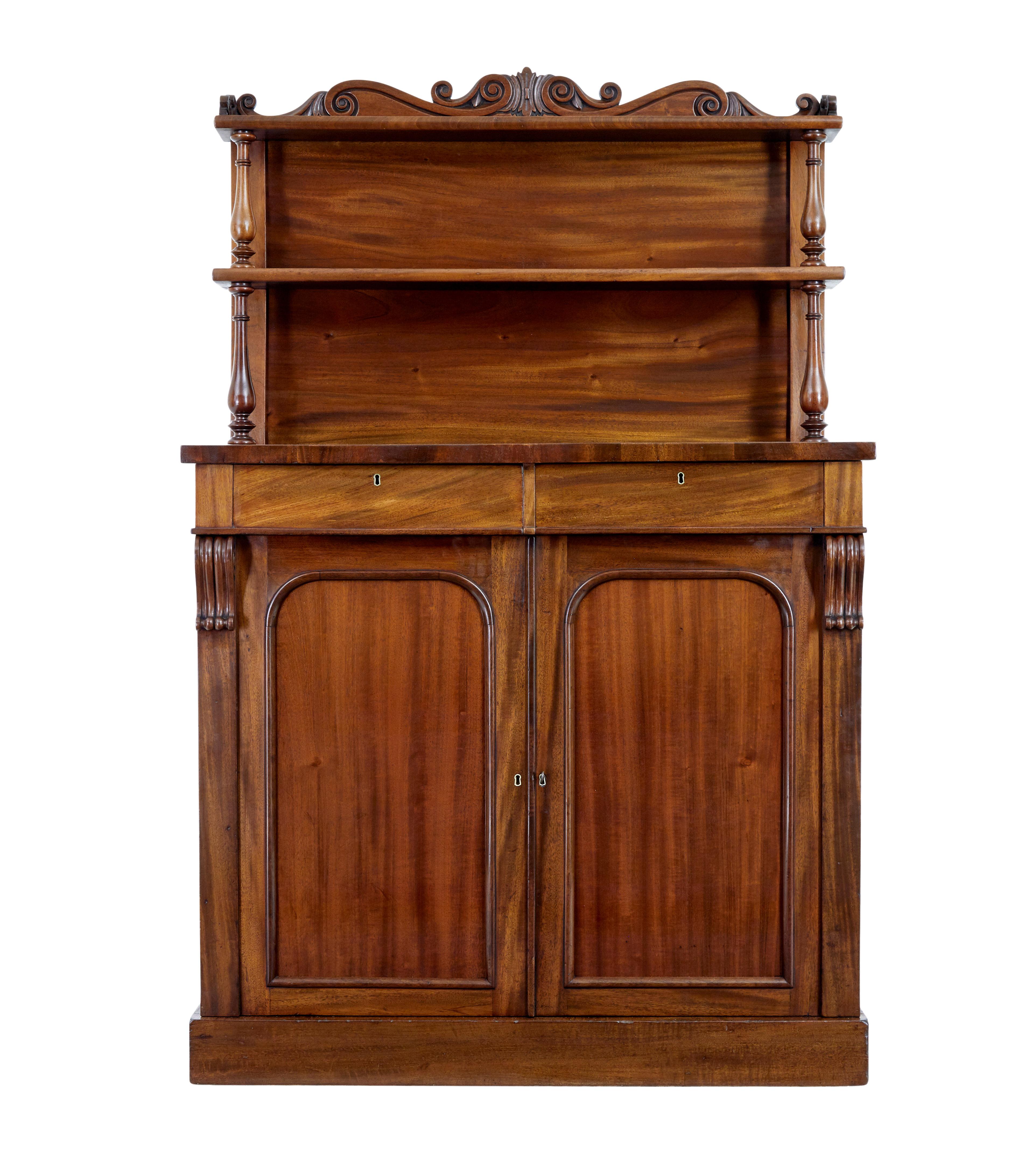 19th century french mahogany chiffonier sideboard, circa 1870.

Good quality sideboard made in rich mahogany. Top section with carved scroll gallery and 2 shelves supported by turned supports. 2 drawers below the top surface, which is veneered in a