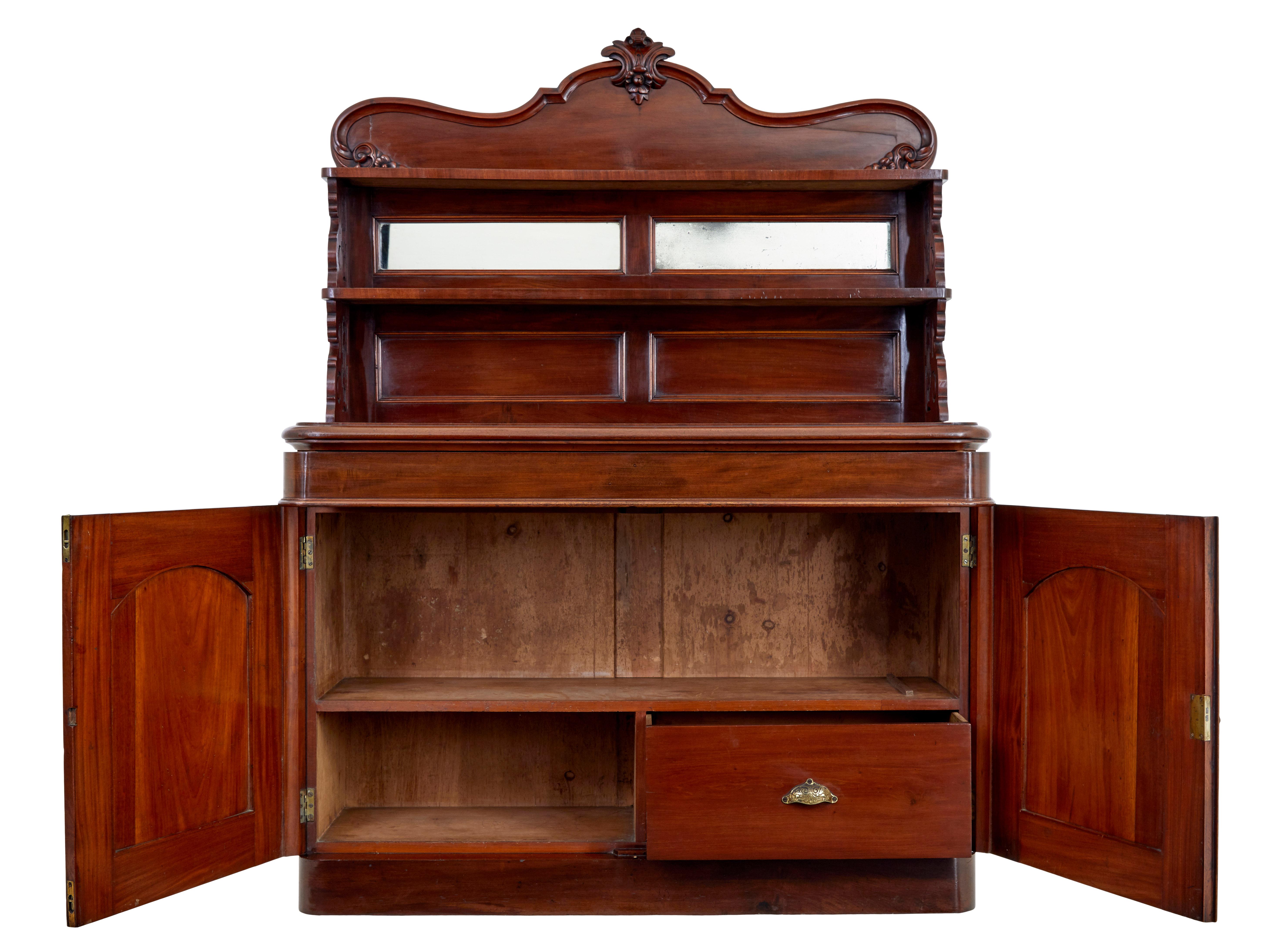 19th century French mahogany chiffonier sideboard circa 1880.

Chiffonier with aesthetic movement influences, made in rich mahogany.

Comprising of 2 sections. The top section with carved ornate gallery and shelf, below which 2 small mirrors above a