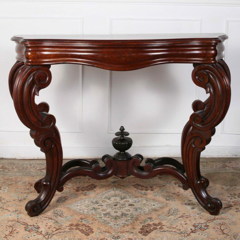 Beautiful solid Mahogany and veneered Louis Phillippe console from Paris. C.1880. Intricately carved base.