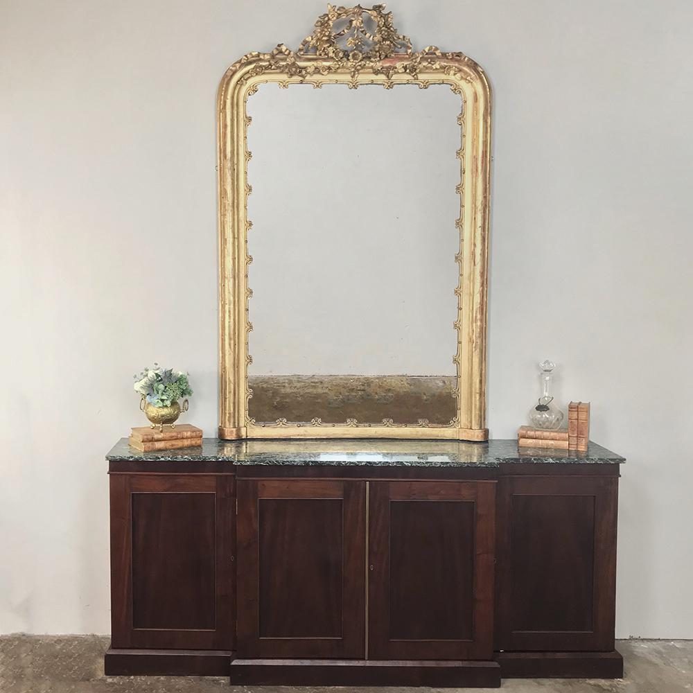 19th century French mahogany marble top buffet represents the essence of restrained elegance, with the sheer natural beauty of the mahogany unfettered by distraction. Step front design still retains a shallow footprint of only 18