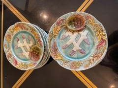 Ensemble de 12 assiettes à asperges et orchies en majolique française du 19ème siècle