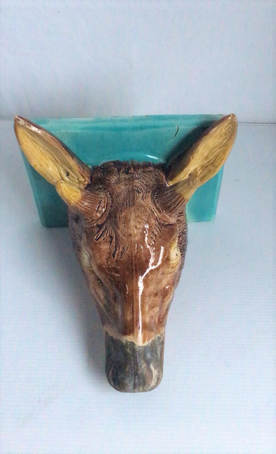 Unusual 19th century French Majolica deer head shelf applique.