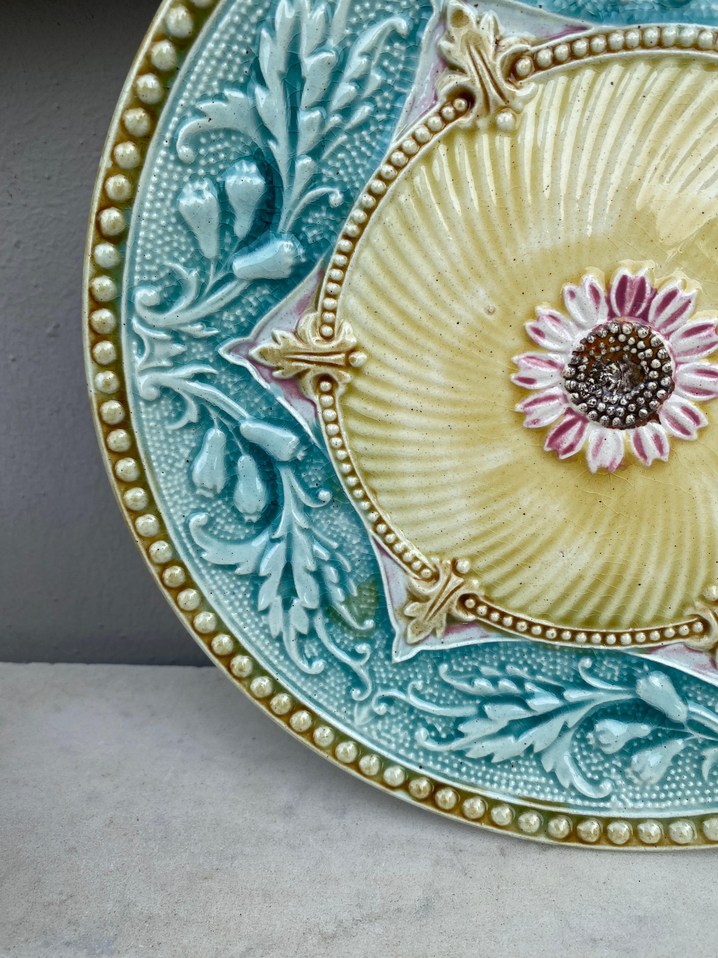 Lovely colorful French Majolica plate with flowers and acanthus leaves Orchies, circa 1890.