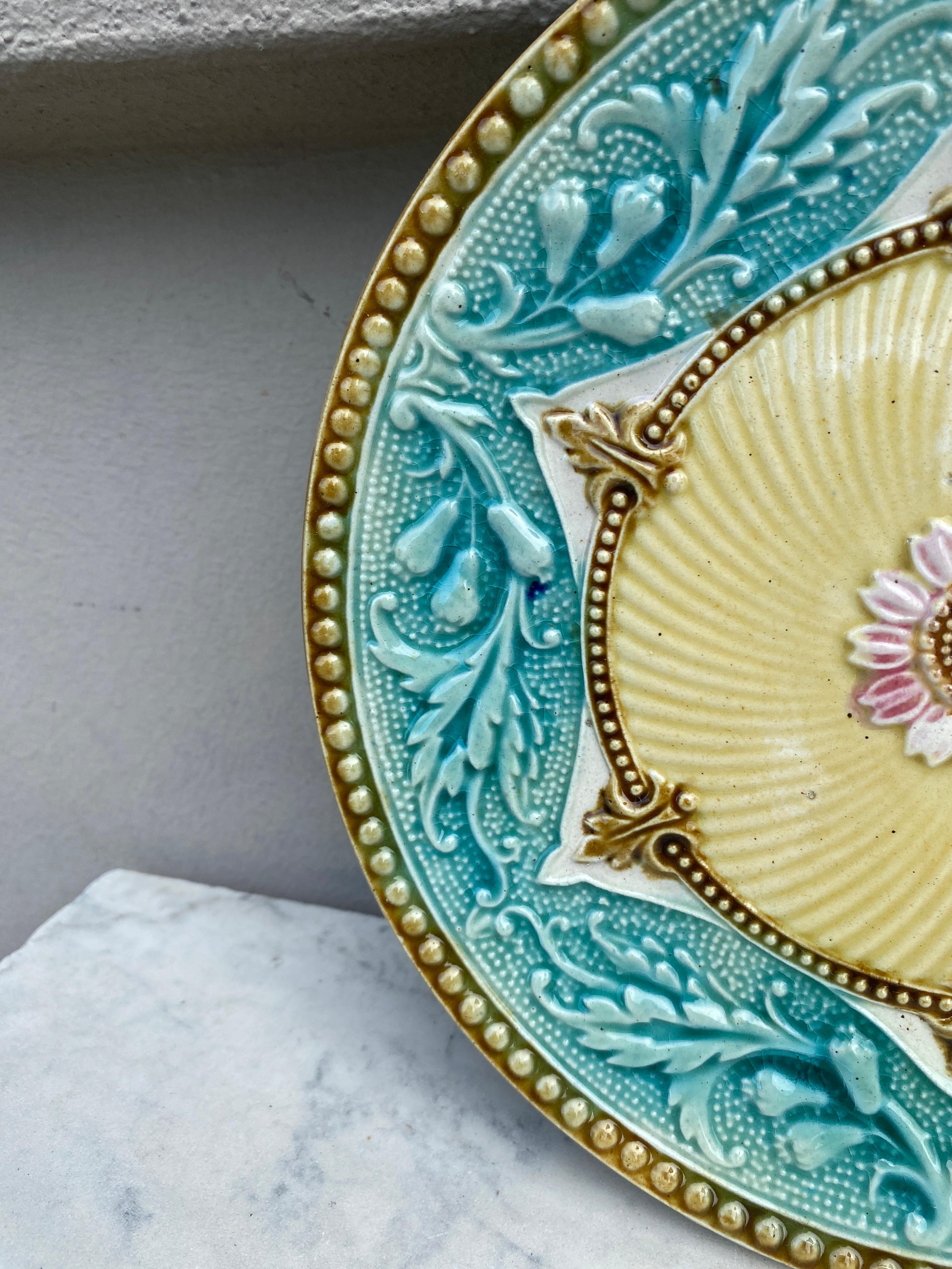 Lovely colorful French Majolica plate with flowers and acanthus leaves Orchies, circa 1890.