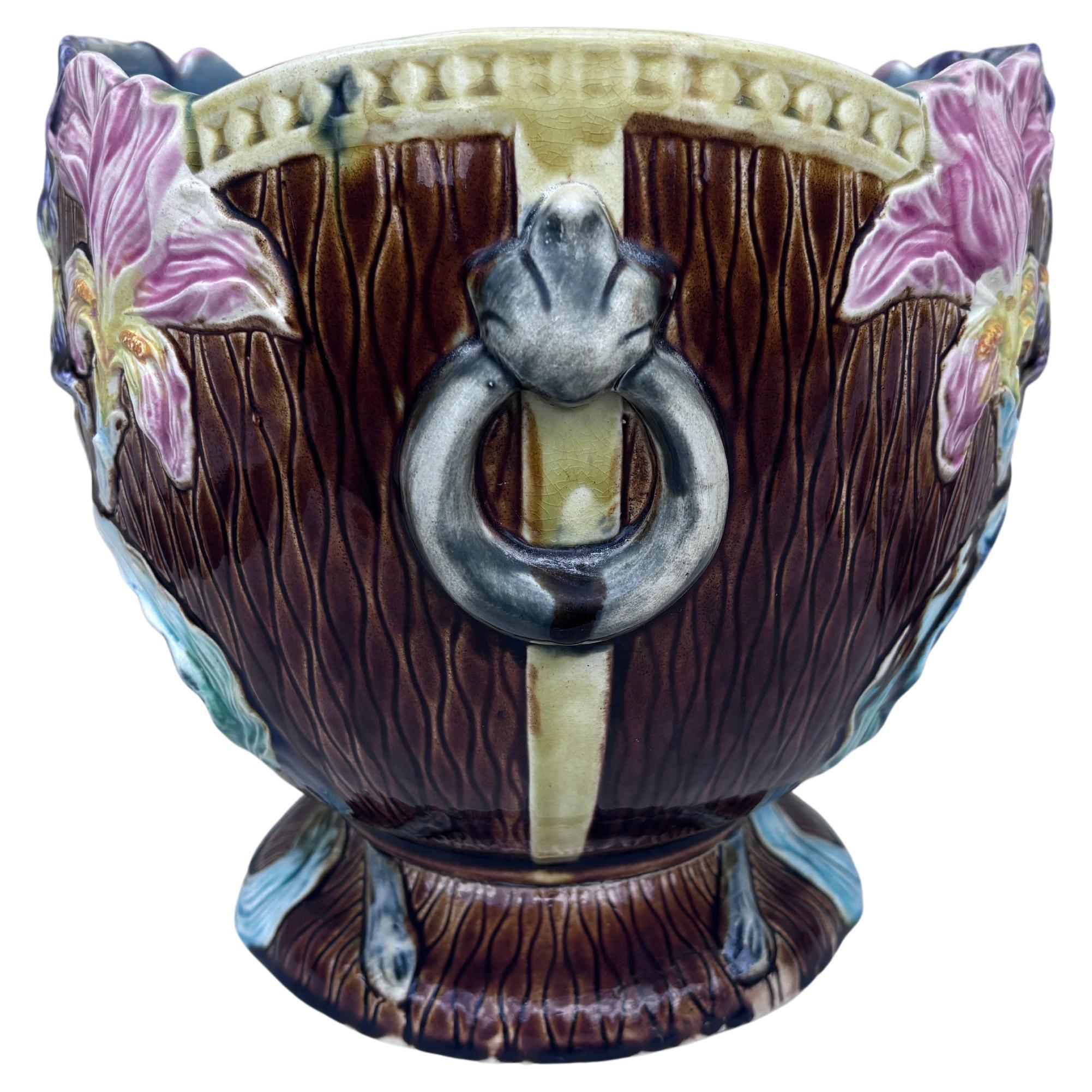 19th French Majolica purple and pink iris cache pot.
H / 8.5 inches 
D / 10 to 8.8 inches.