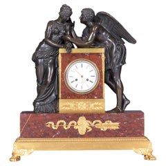 Pendule de cheminée française du 19ème siècle signée Caron a Paris représentant Psyché et Cupidon